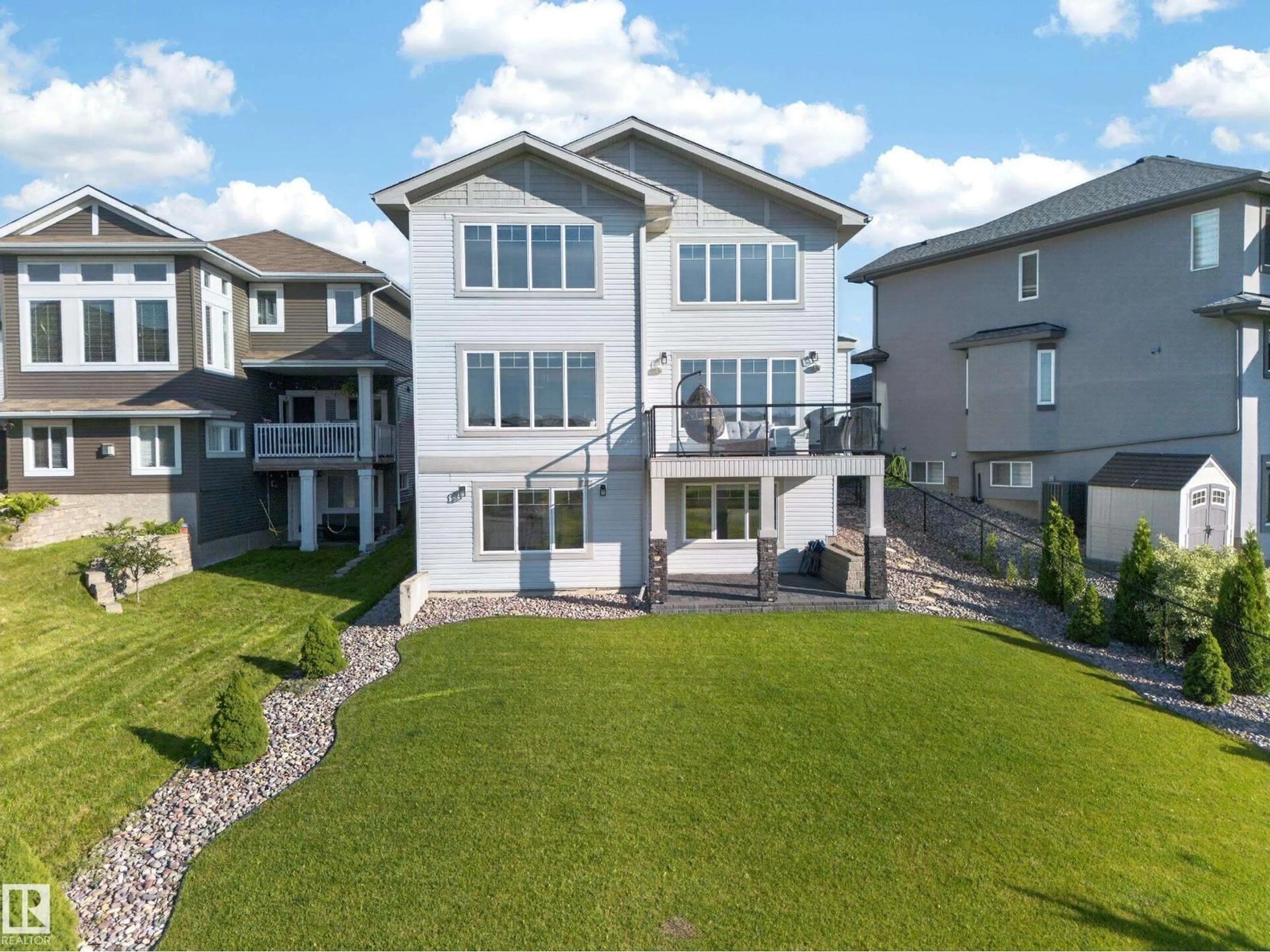 A pic from outside/outdoor area/front of a property/back of a property/a pic from drone, unknown for NW - 7640 179 AV, Edmonton Alberta T5Z0L2