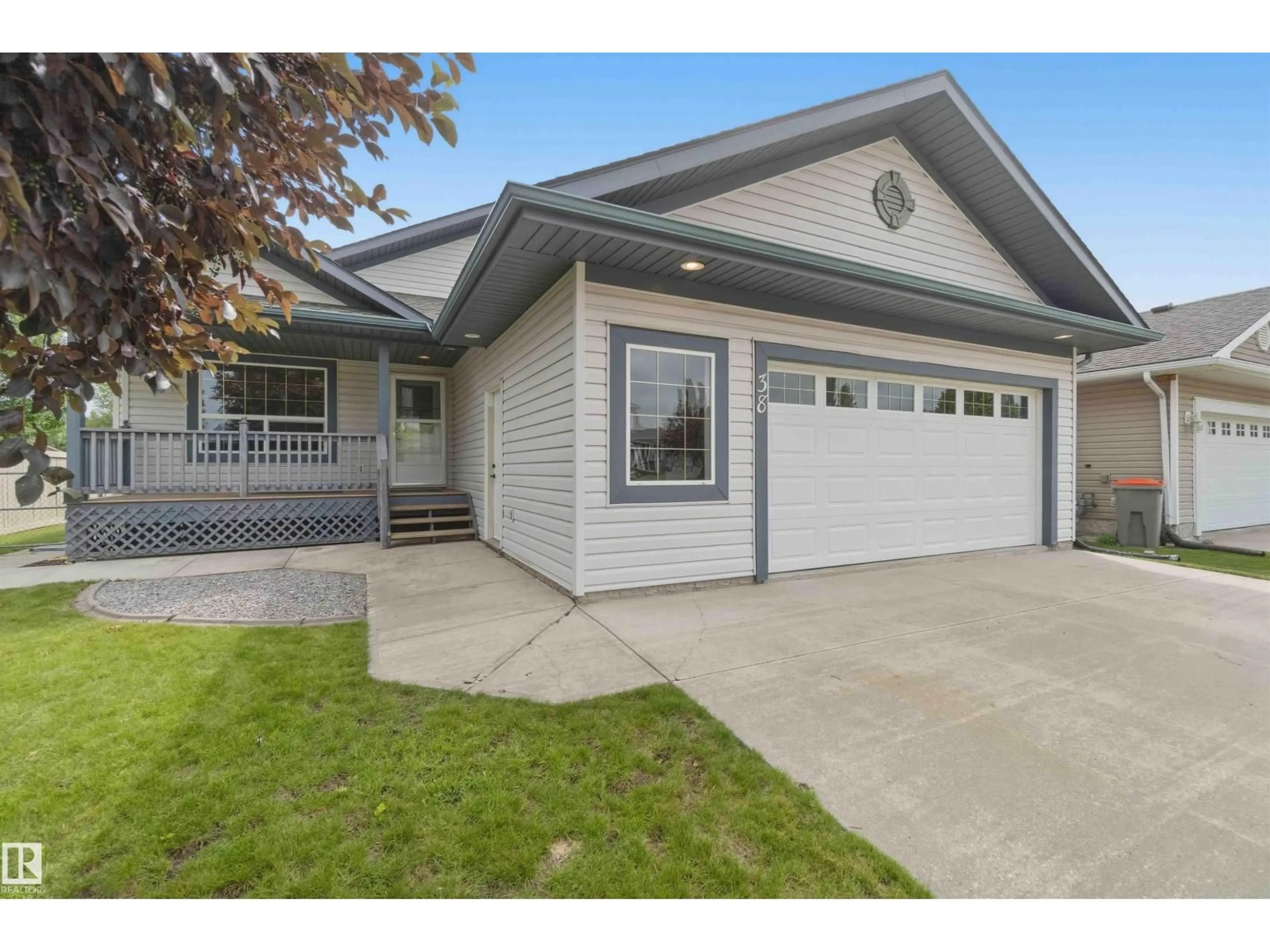Home with vinyl exterior material, street for 38 WILLOW PARK RD, Stony Plain Alberta T7Z2X8