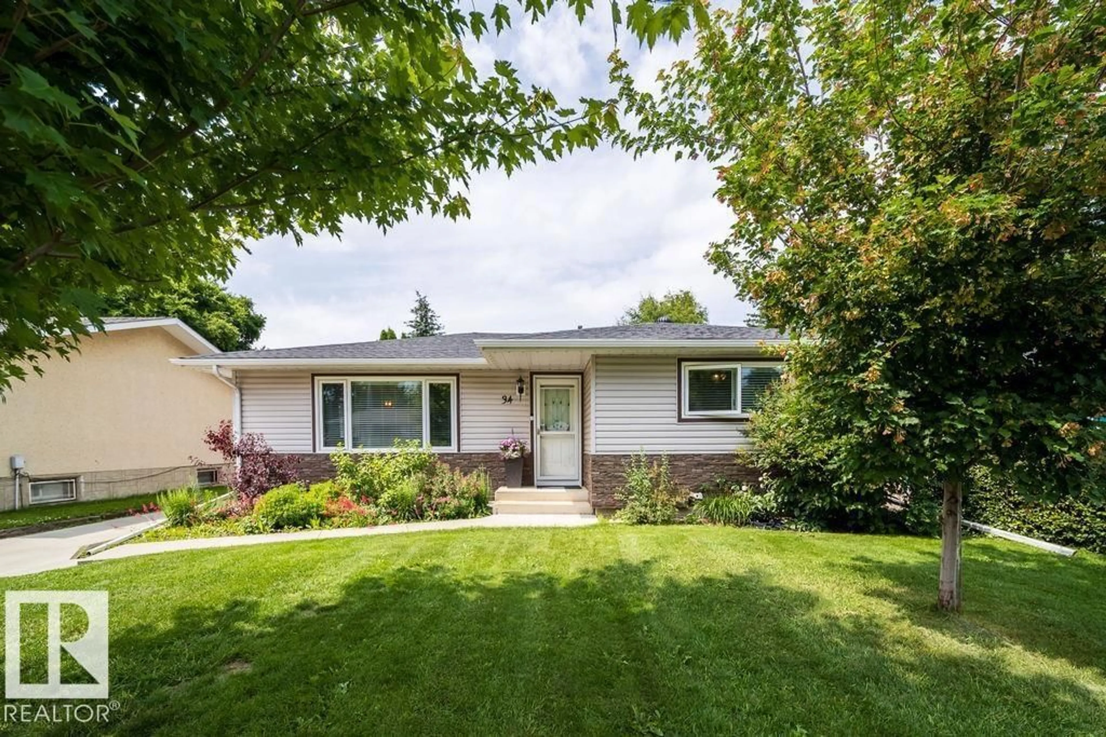 Home with vinyl exterior material, street for 34 PEACOCK DR, Sherwood Park Alberta T8A0A8