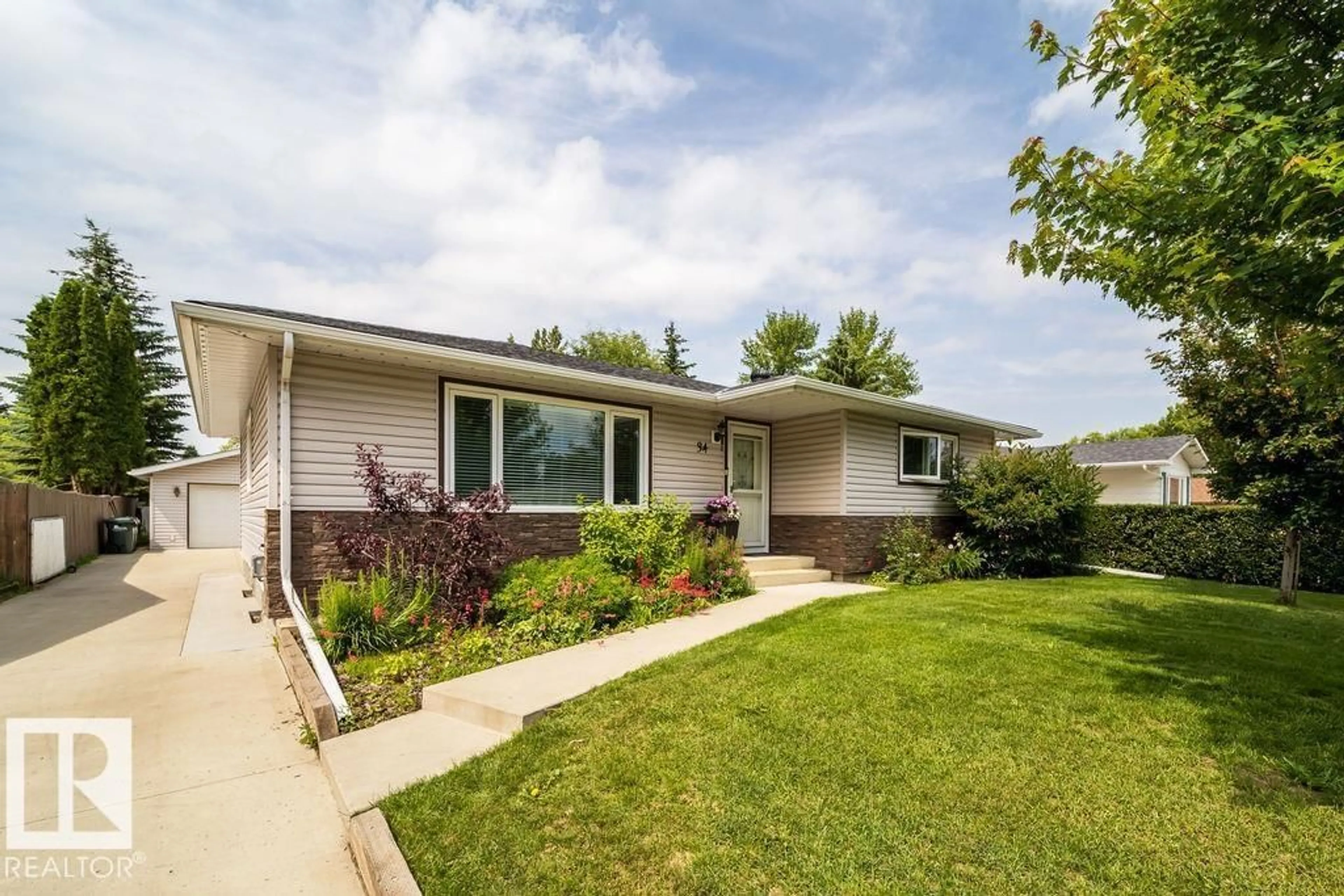 Home with vinyl exterior material, street for 34 PEACOCK DR, Sherwood Park Alberta T8A0A8