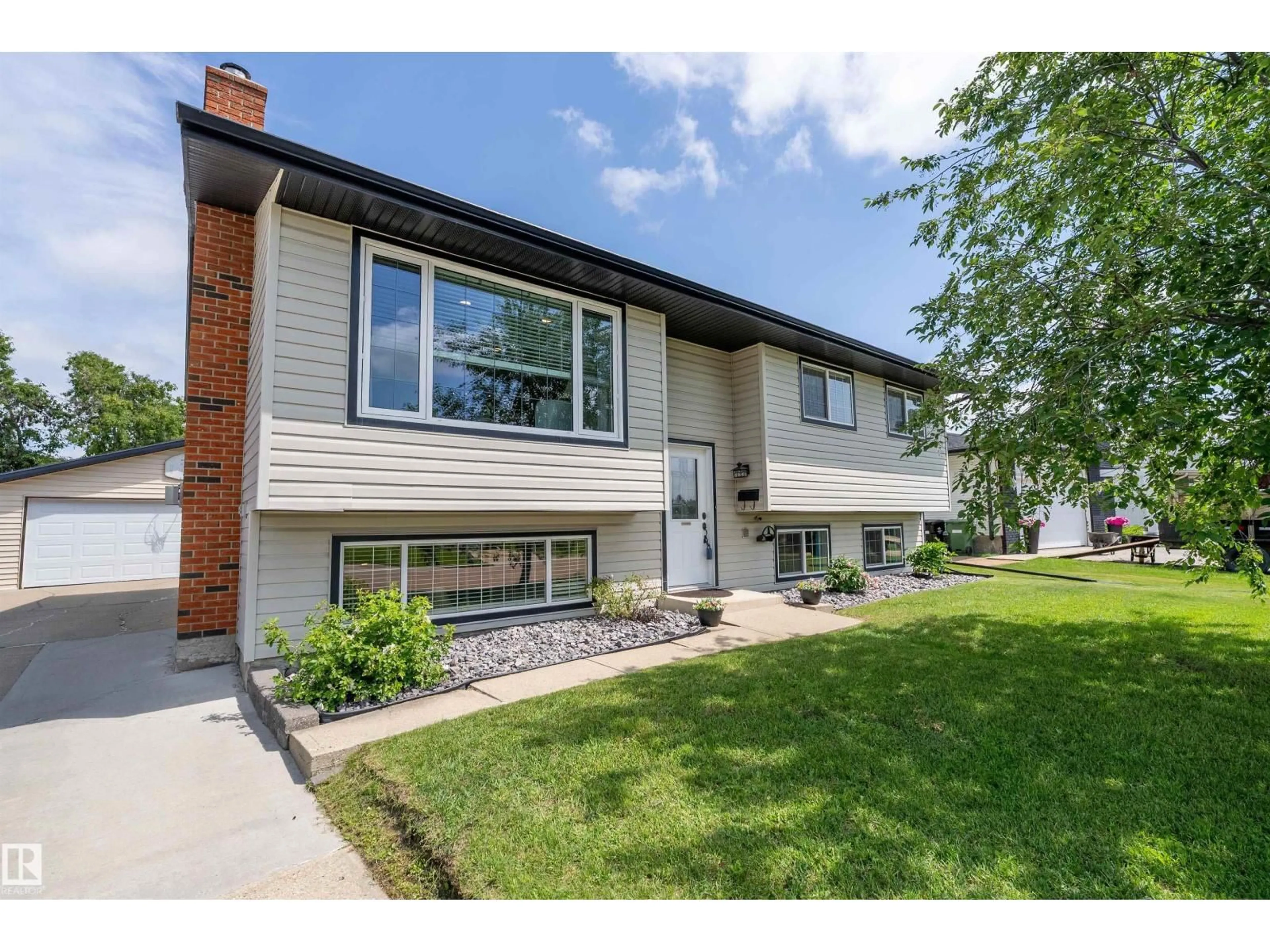 Home with vinyl exterior material, street for 3915 42B AV, Leduc Alberta T9E4W9