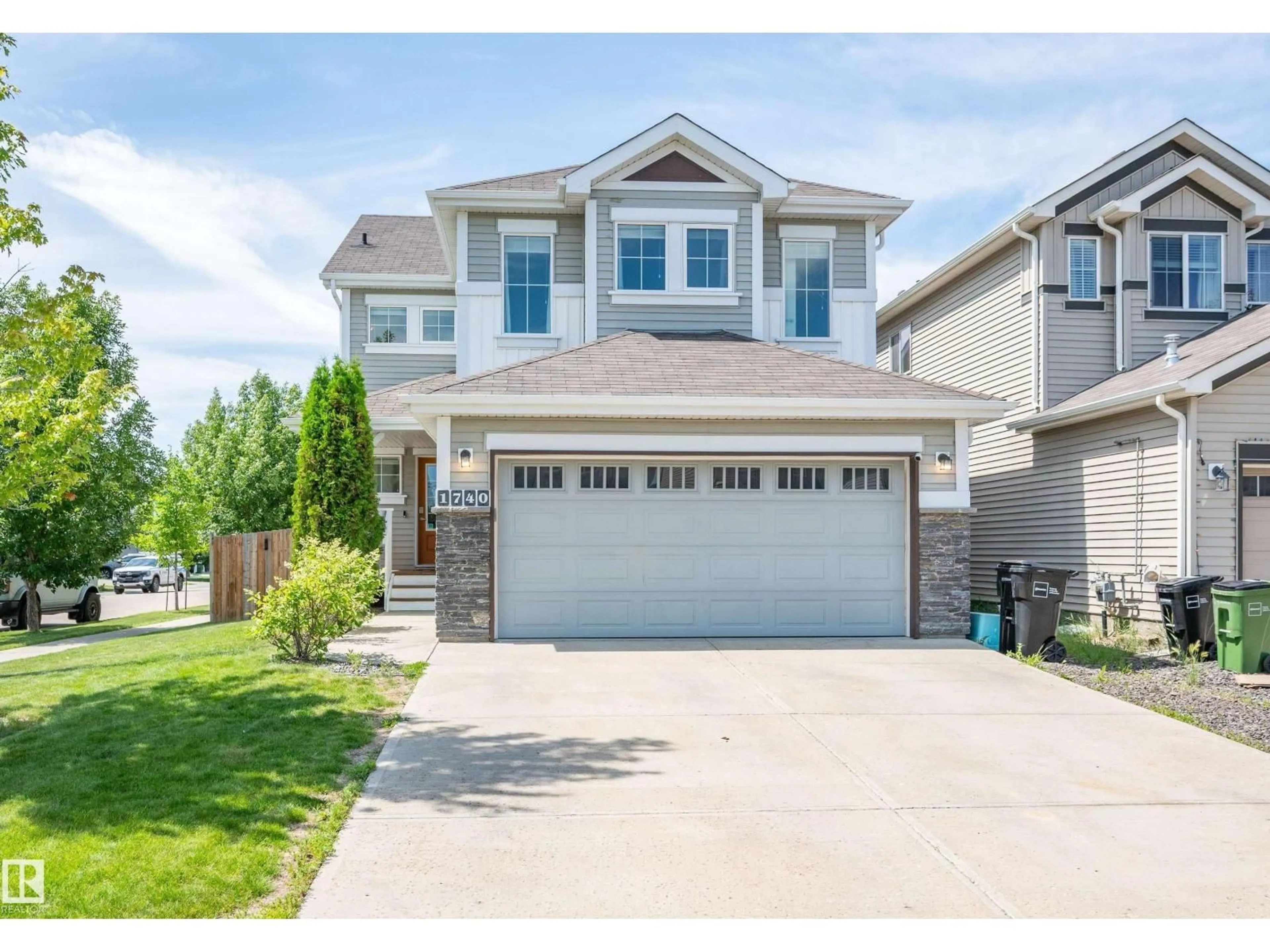 Home with vinyl exterior material, street for 1740 59 ST, Edmonton Alberta T6X0W5