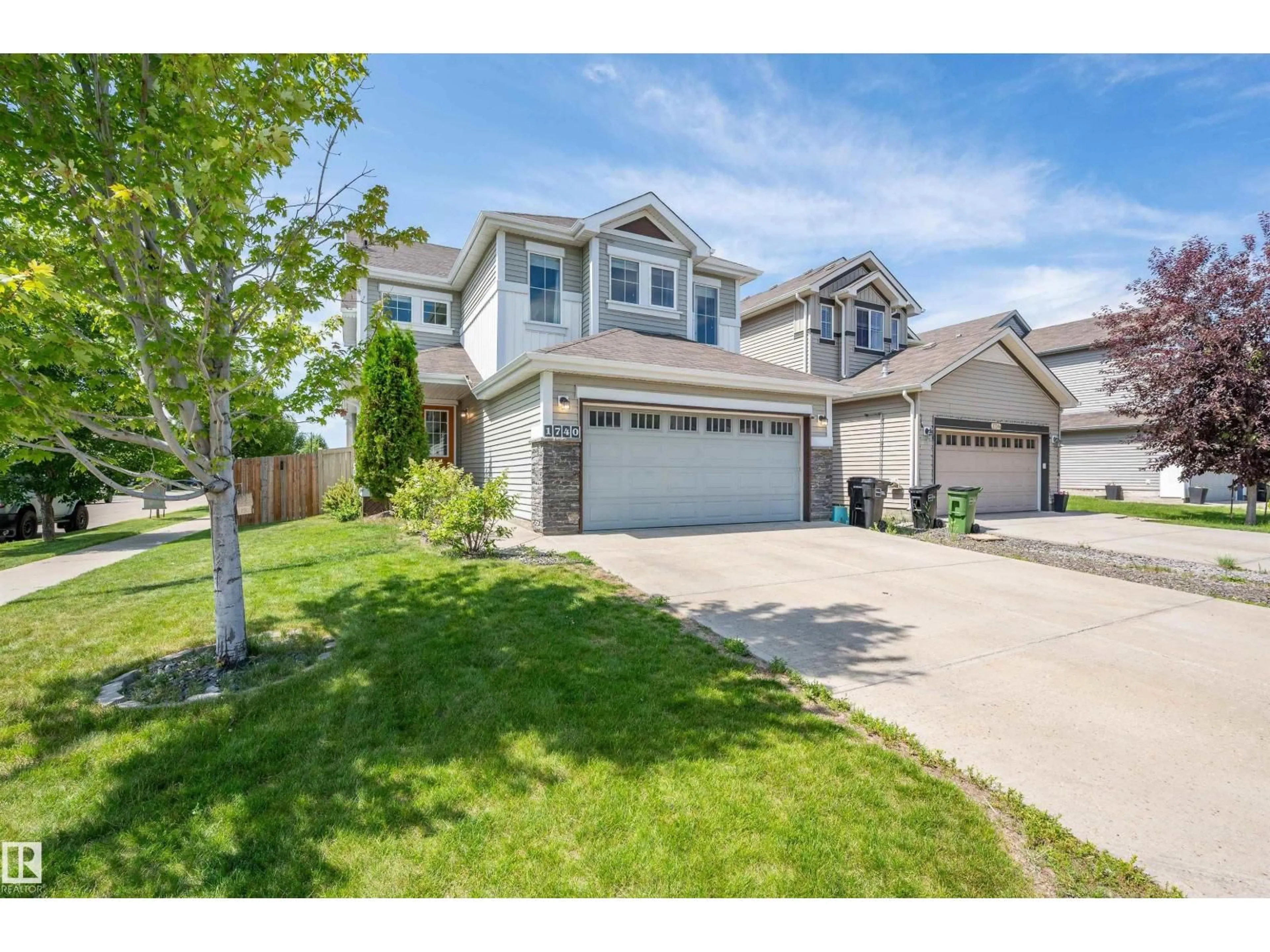 Home with vinyl exterior material, street for 1740 59 ST, Edmonton Alberta T6X0W5