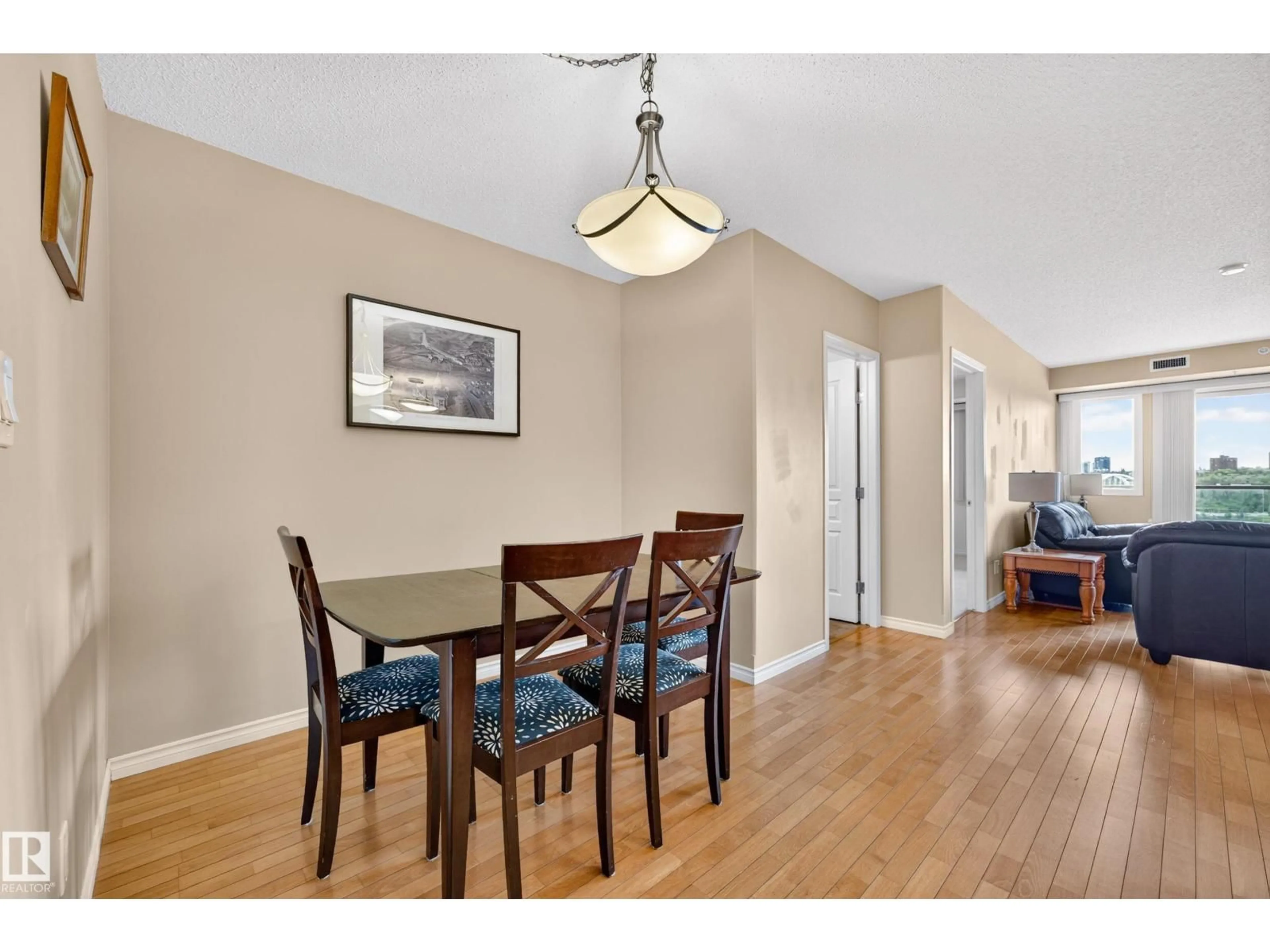 Dining room, wood/laminate floor for 703 - 9707 106 ST NW, Edmonton Alberta T5K0B7