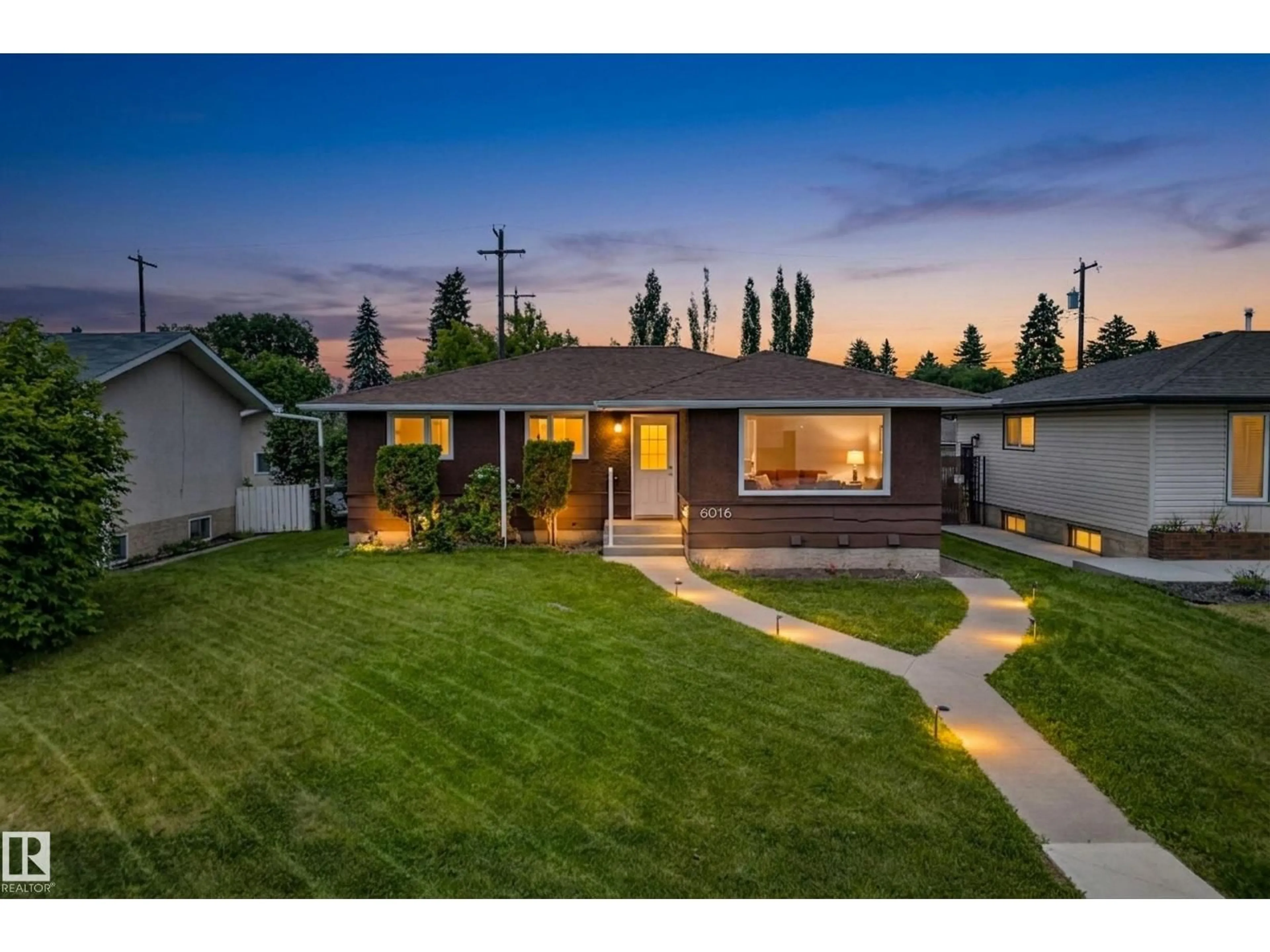Home with brick exterior material, street for 6016 92 AV, Edmonton Alberta T6B0S4