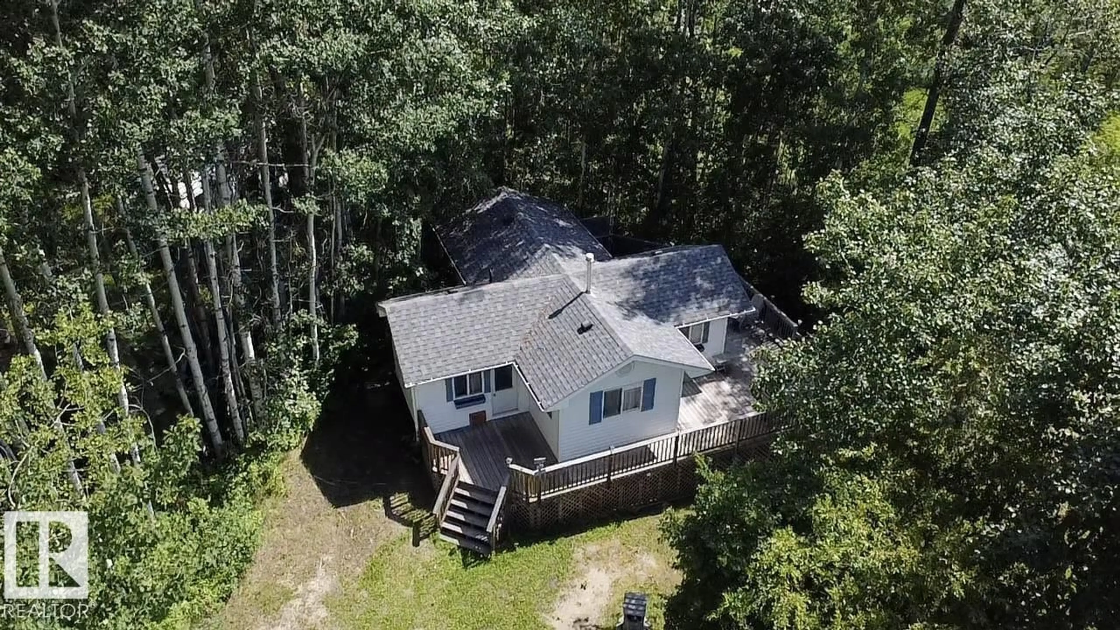 A pic from outside/outdoor area/front of a property/back of a property/a pic from drone, unknown for 55107 - 707 RGE ROAD 33, Rural Lac Ste. Anne County Alberta T0E1A0