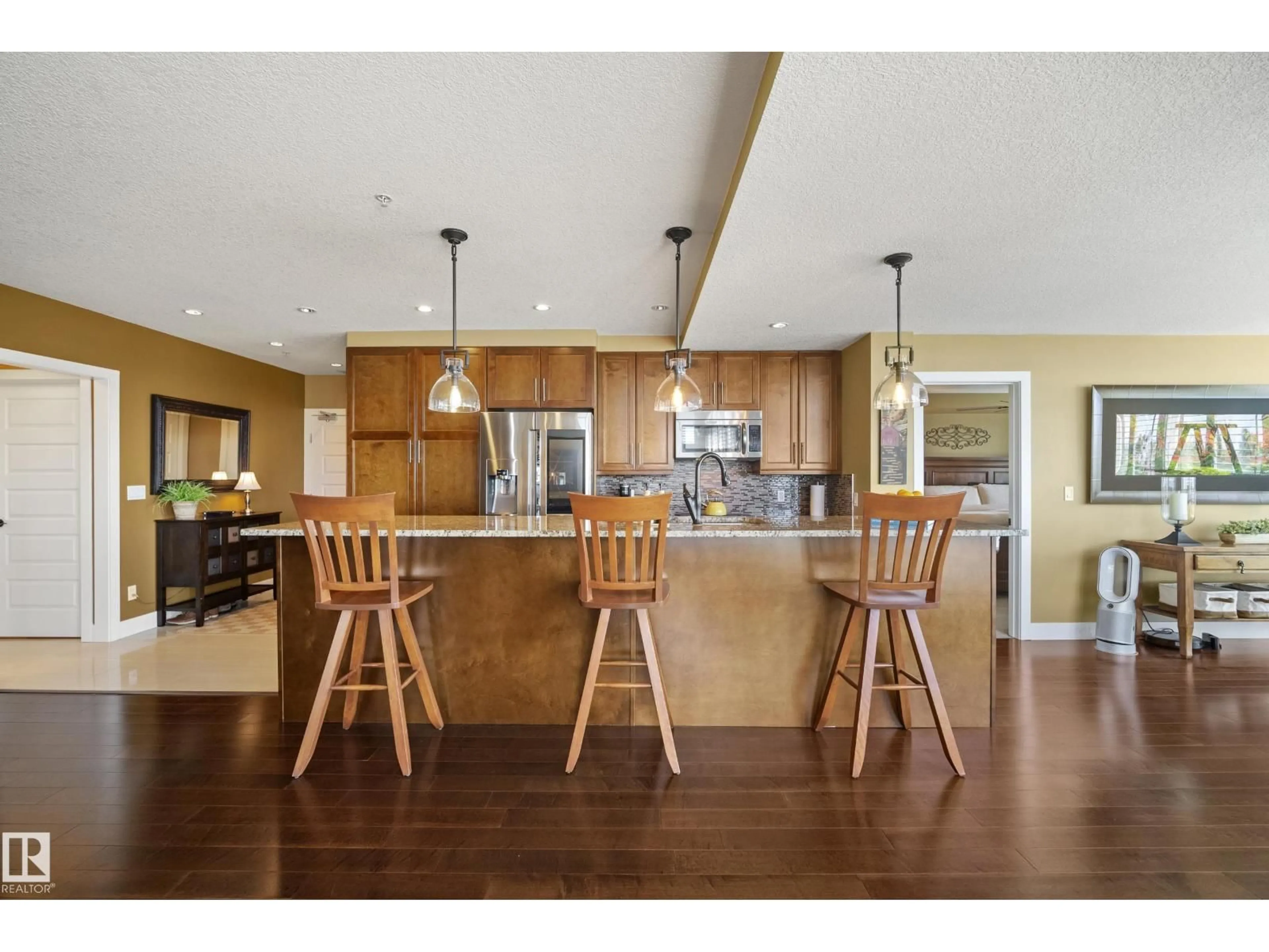 Open concept kitchen, wood/laminate floor for #405 - 1350 WINDERMERE WY, Edmonton Alberta T6W2J3