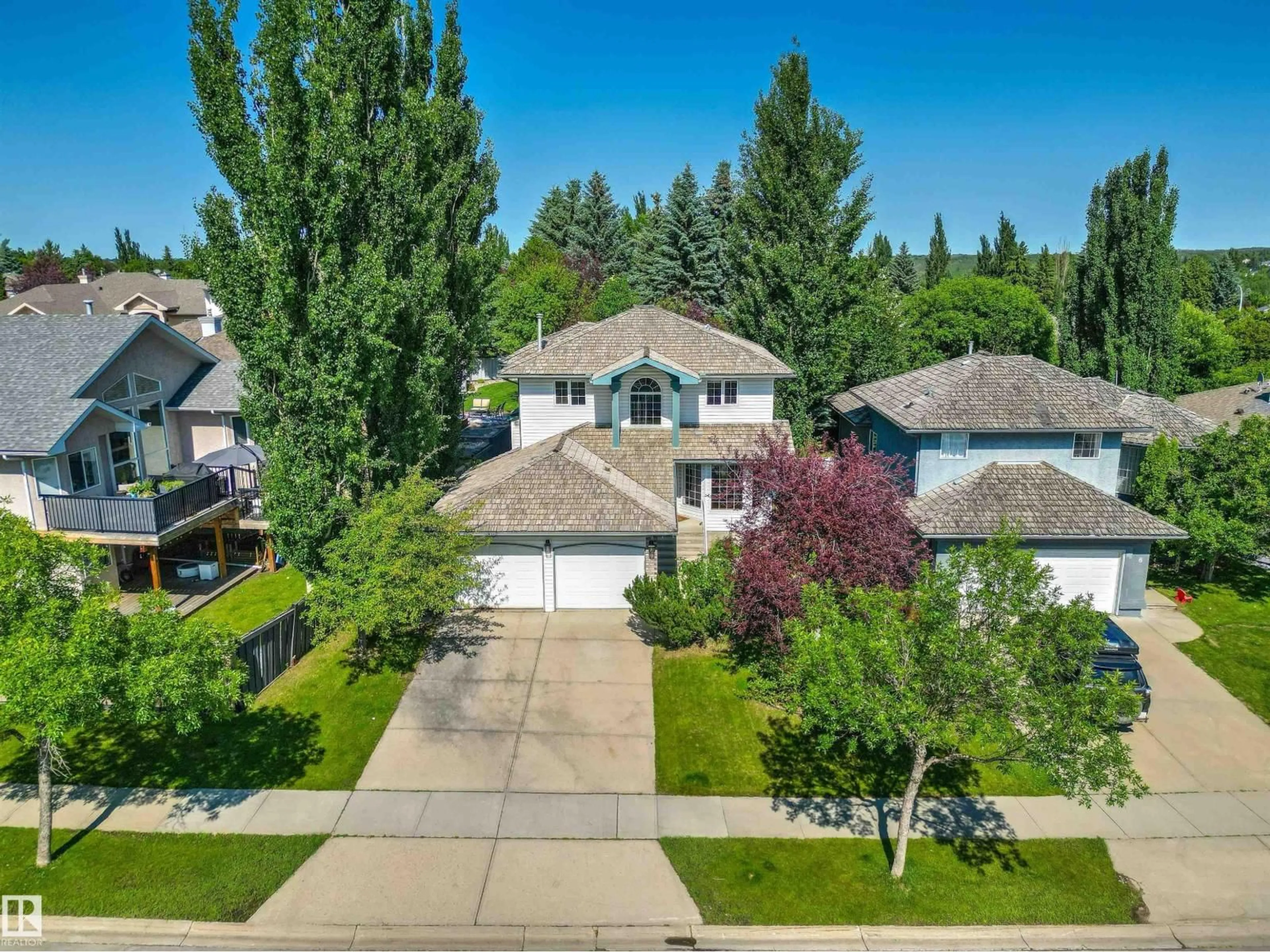 A pic from outside/outdoor area/front of a property/back of a property/a pic from drone, street for 6 OAKRIDGE DR, St. Albert Alberta T8N6E4