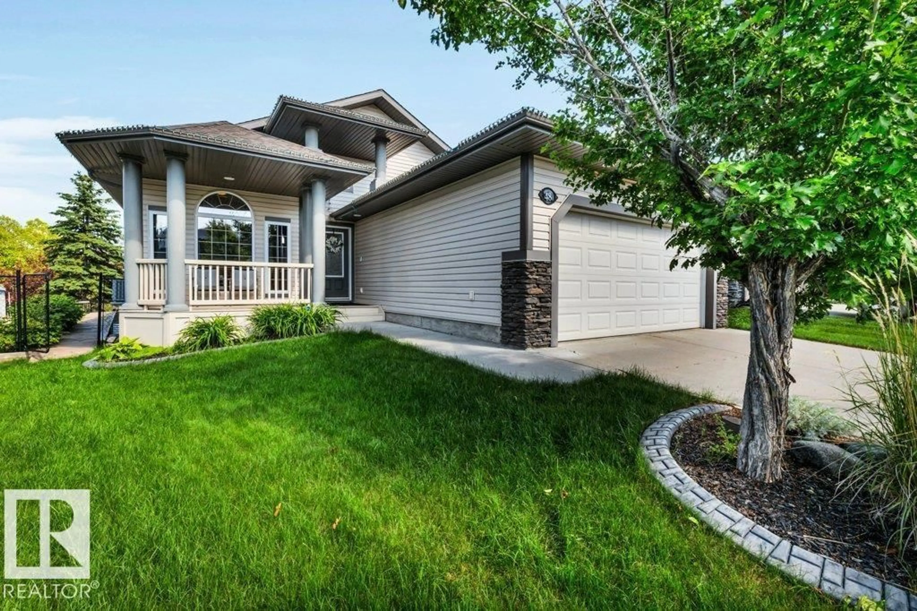 Home with vinyl exterior material, street for 48 LAMPLIGHT, Spruce Grove Alberta T7X0G8