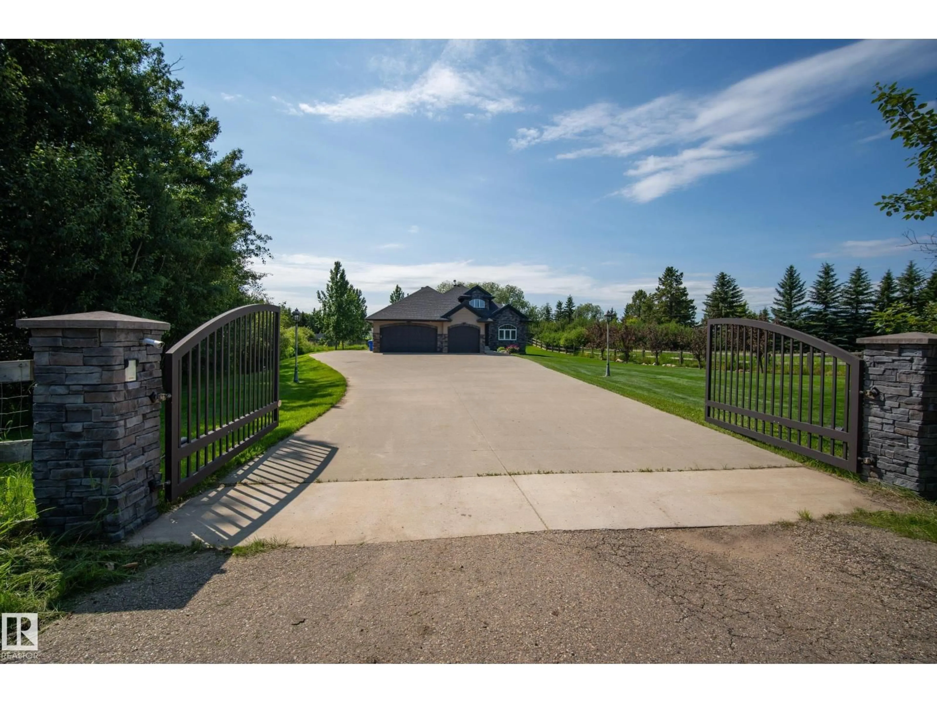 A pic from outside/outdoor area/front of a property/back of a property/a pic from drone, street for 23549 - 115 TWP RD 510, Rural Leduc County Alberta T4X0T1