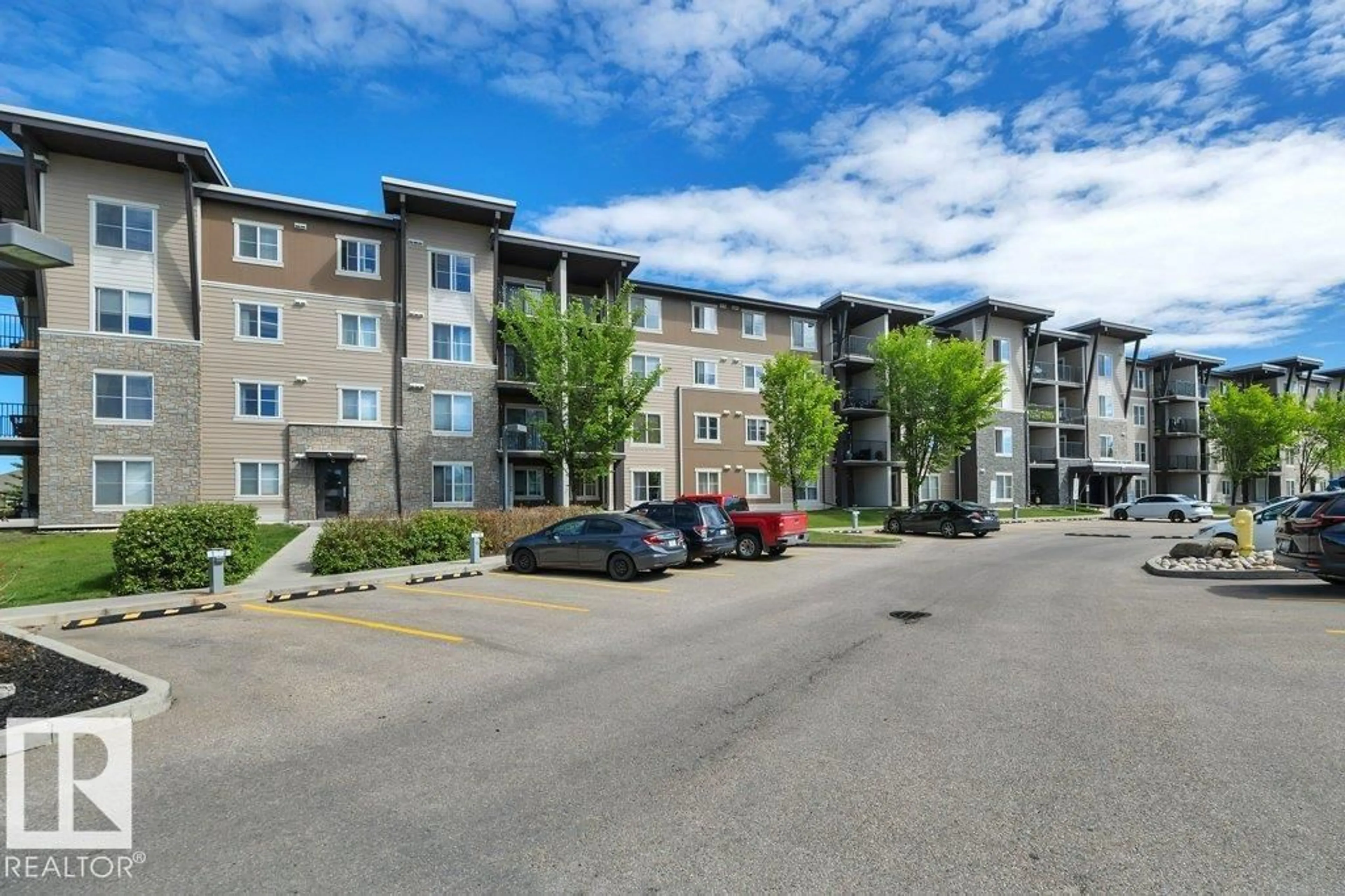 A pic from outside/outdoor area/front of a property/back of a property/a pic from drone, unknown for 201 - 534 WATT BV, Edmonton Alberta T6X1P7