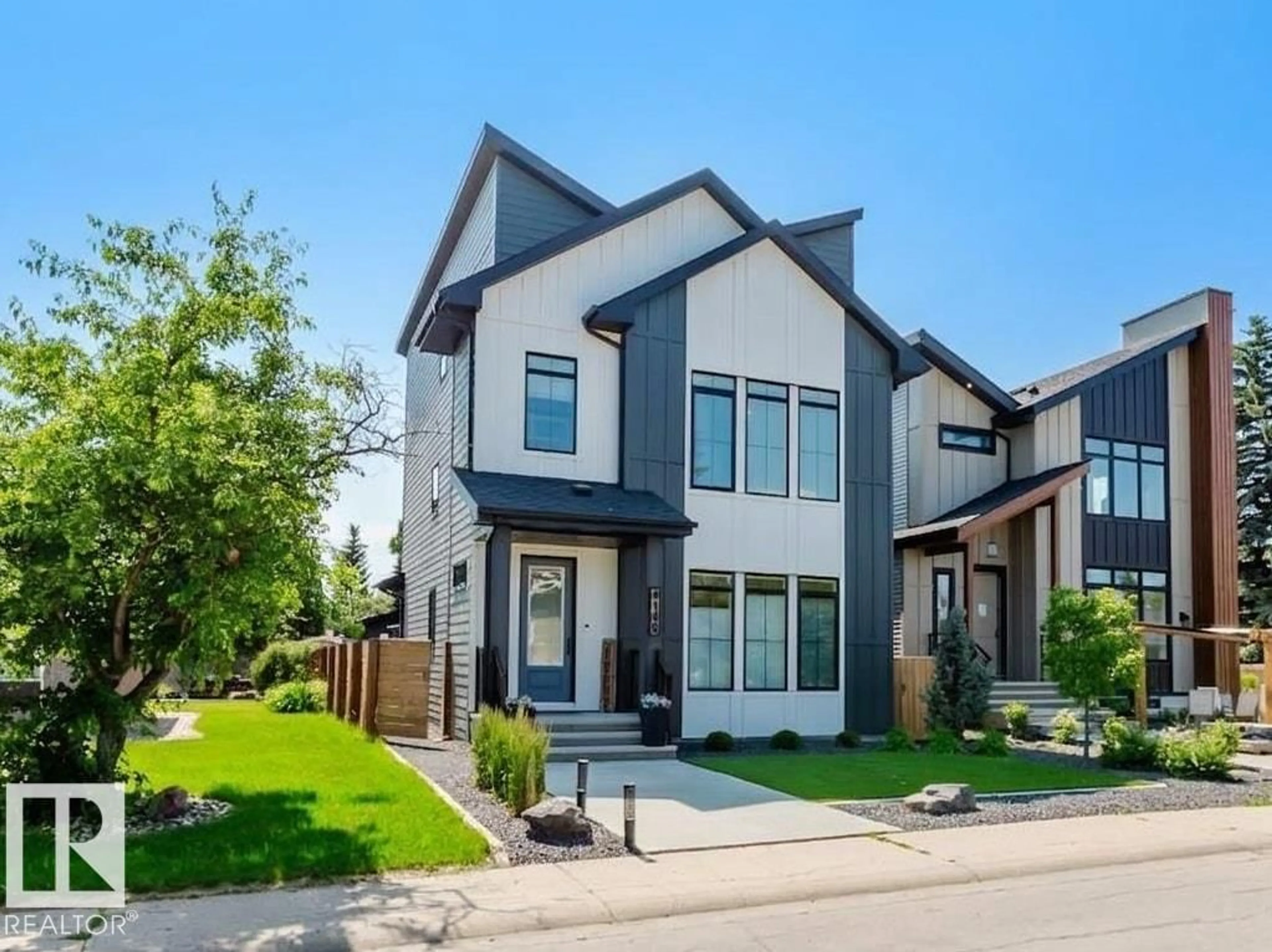 Home with vinyl exterior material, street for 4140 122 ST, Edmonton Alberta T6J1Z2