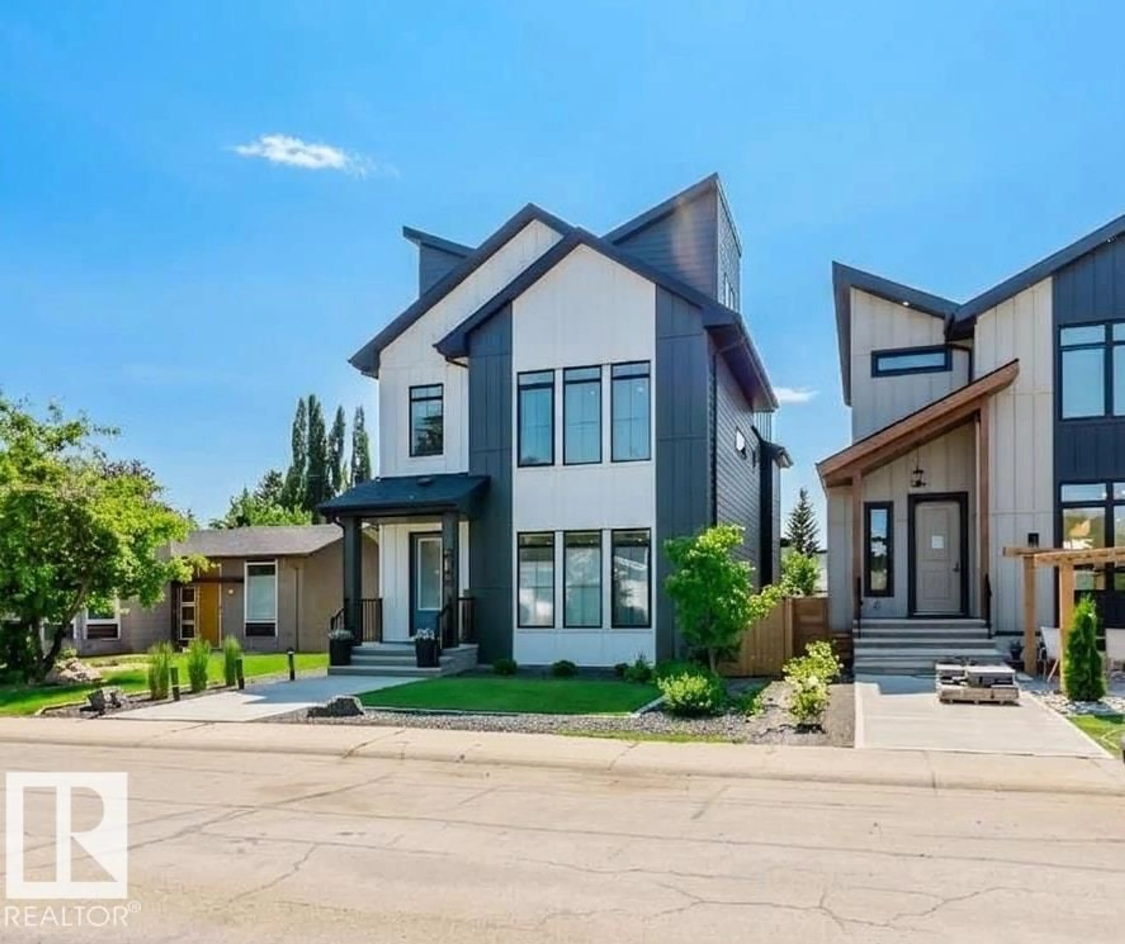 Home with vinyl exterior material, street for 4140 122 ST, Edmonton Alberta T6J1Z2