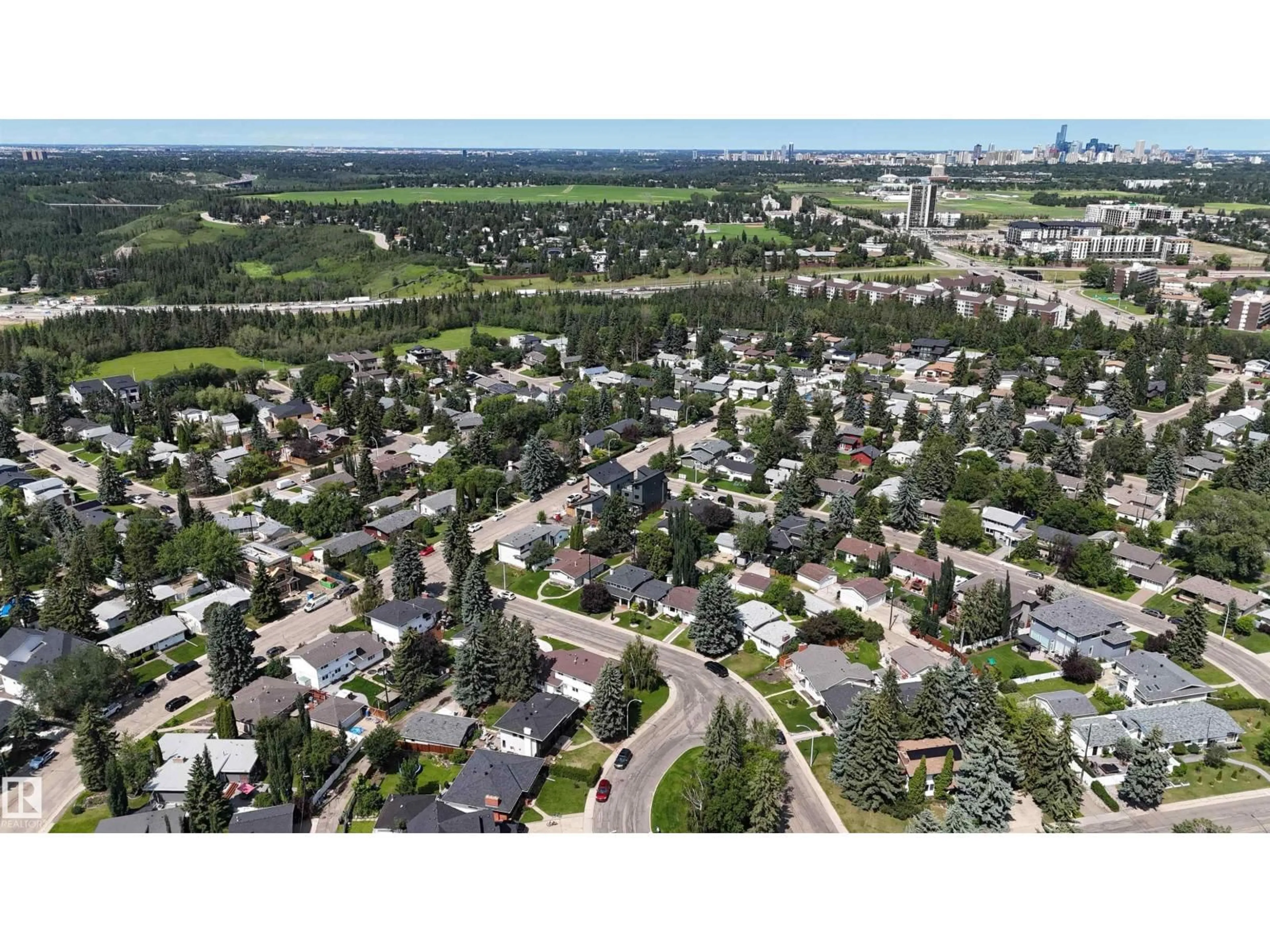 A pic from outside/outdoor area/front of a property/back of a property/a pic from drone, street for 4140 122 ST, Edmonton Alberta T6J1Z2