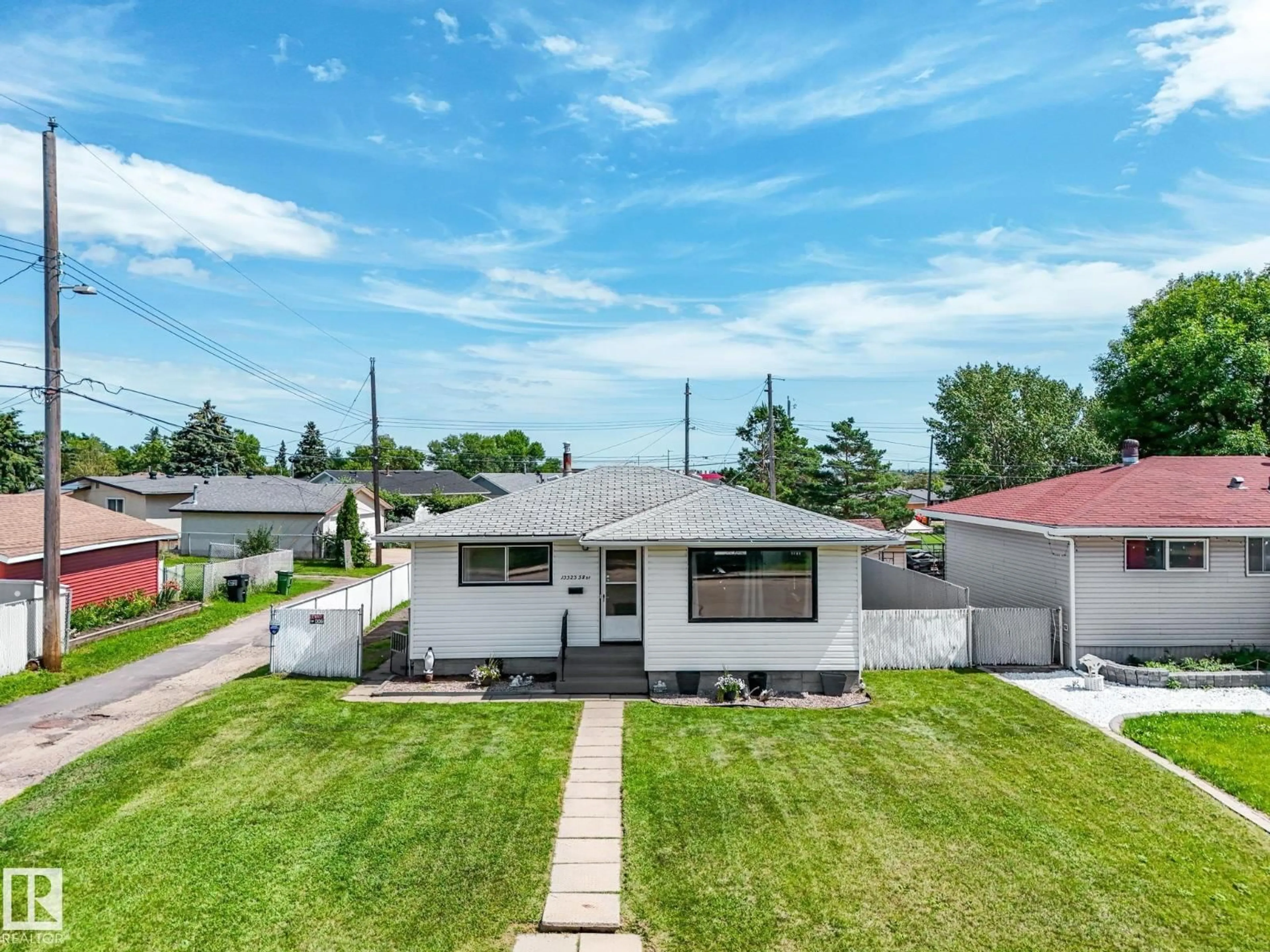 A pic from outside/outdoor area/front of a property/back of a property/a pic from drone, street for 13323 58 ST, Edmonton Alberta T5A0P9
