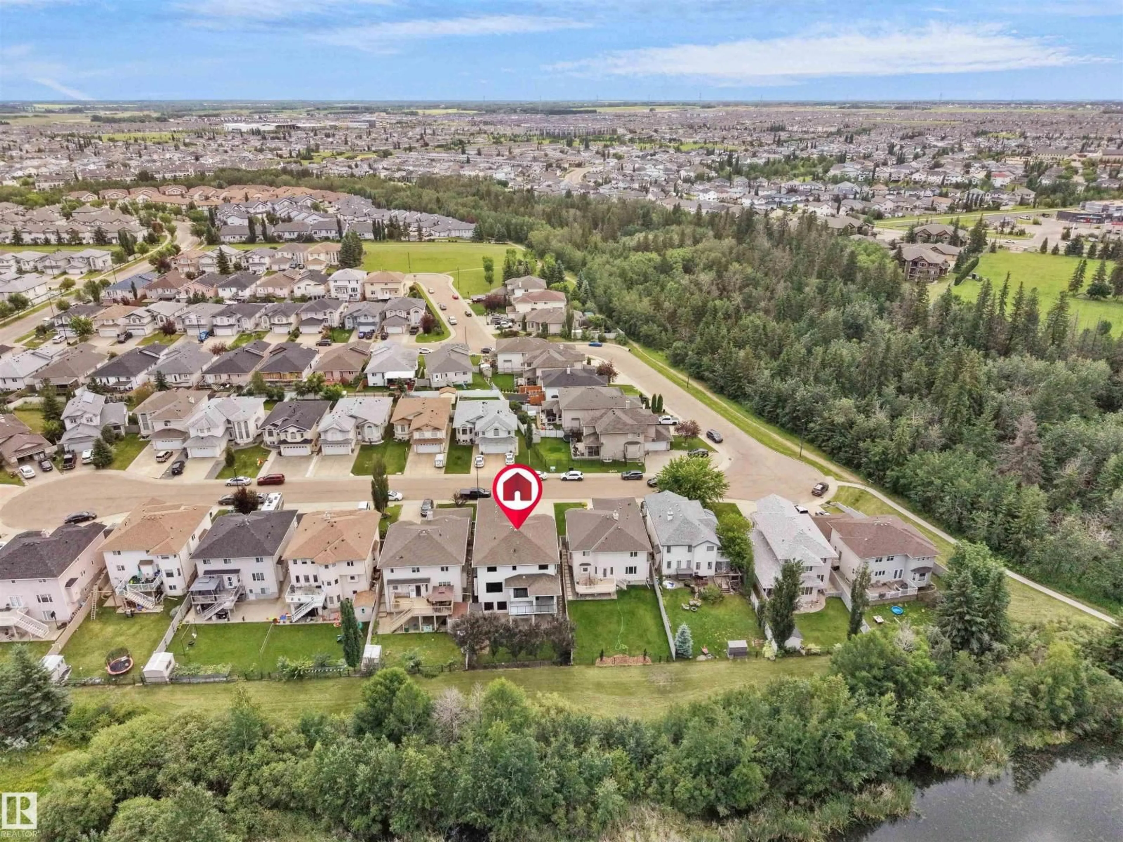 A pic from outside/outdoor area/front of a property/back of a property/a pic from drone, water/lake/river/ocean view for 3136 35 AV, Edmonton Alberta T6T1T7