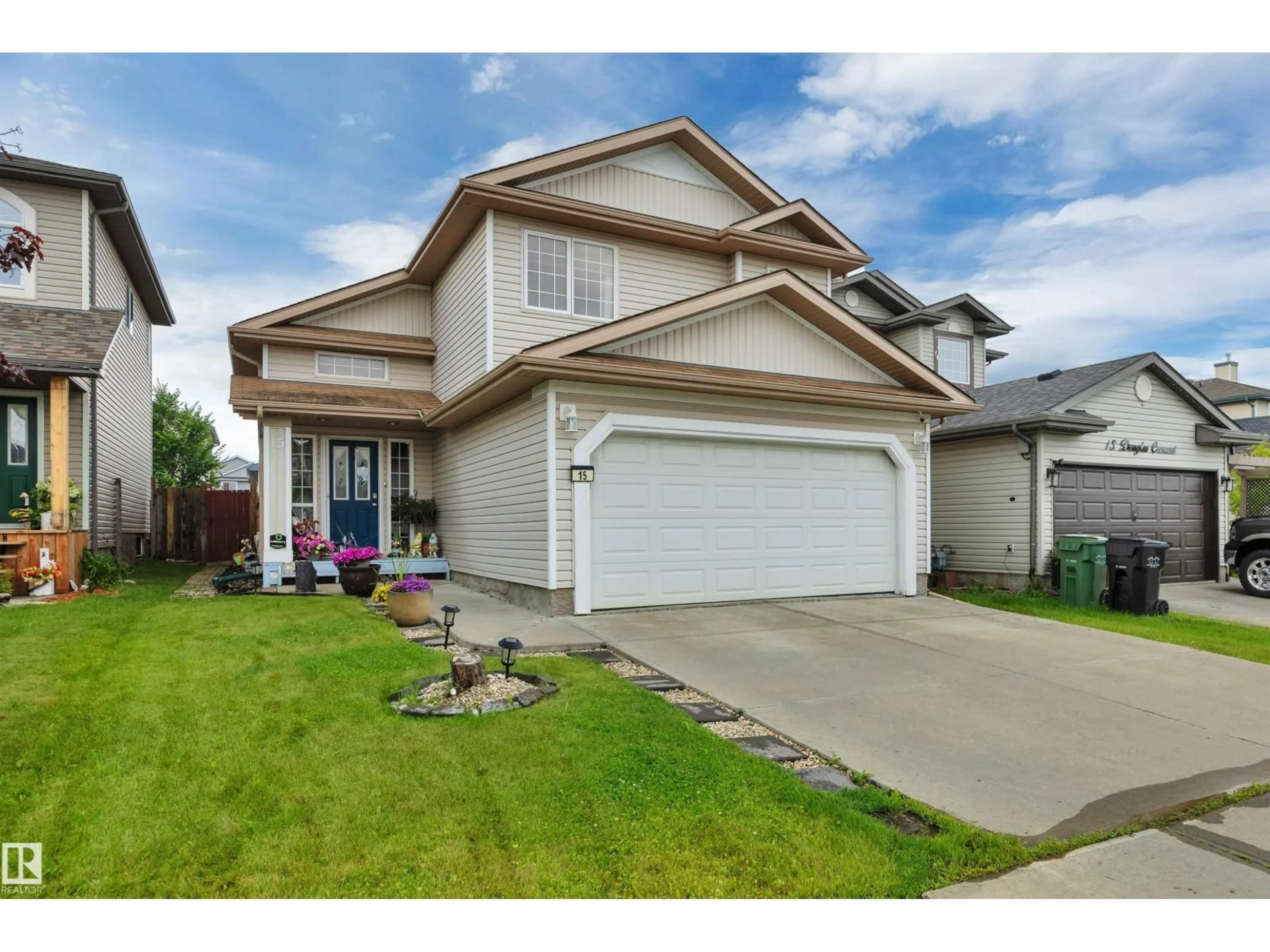 Home with vinyl exterior material, street for 15 DOUGLAS CR, Leduc Alberta T9E8P3