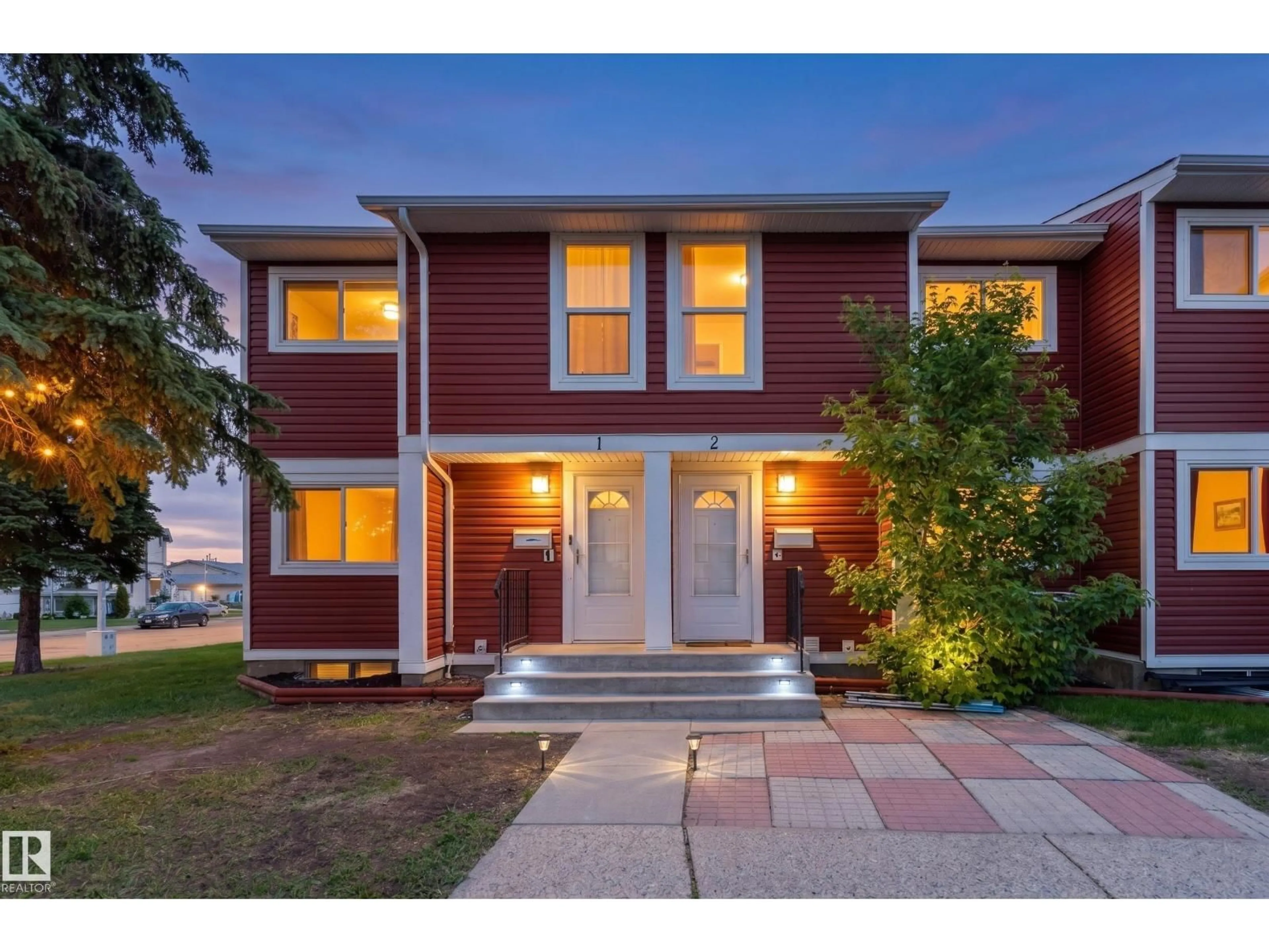 Home with brick exterior material, street for #2 - 4707 126 AV, Edmonton Alberta T5A4K4
