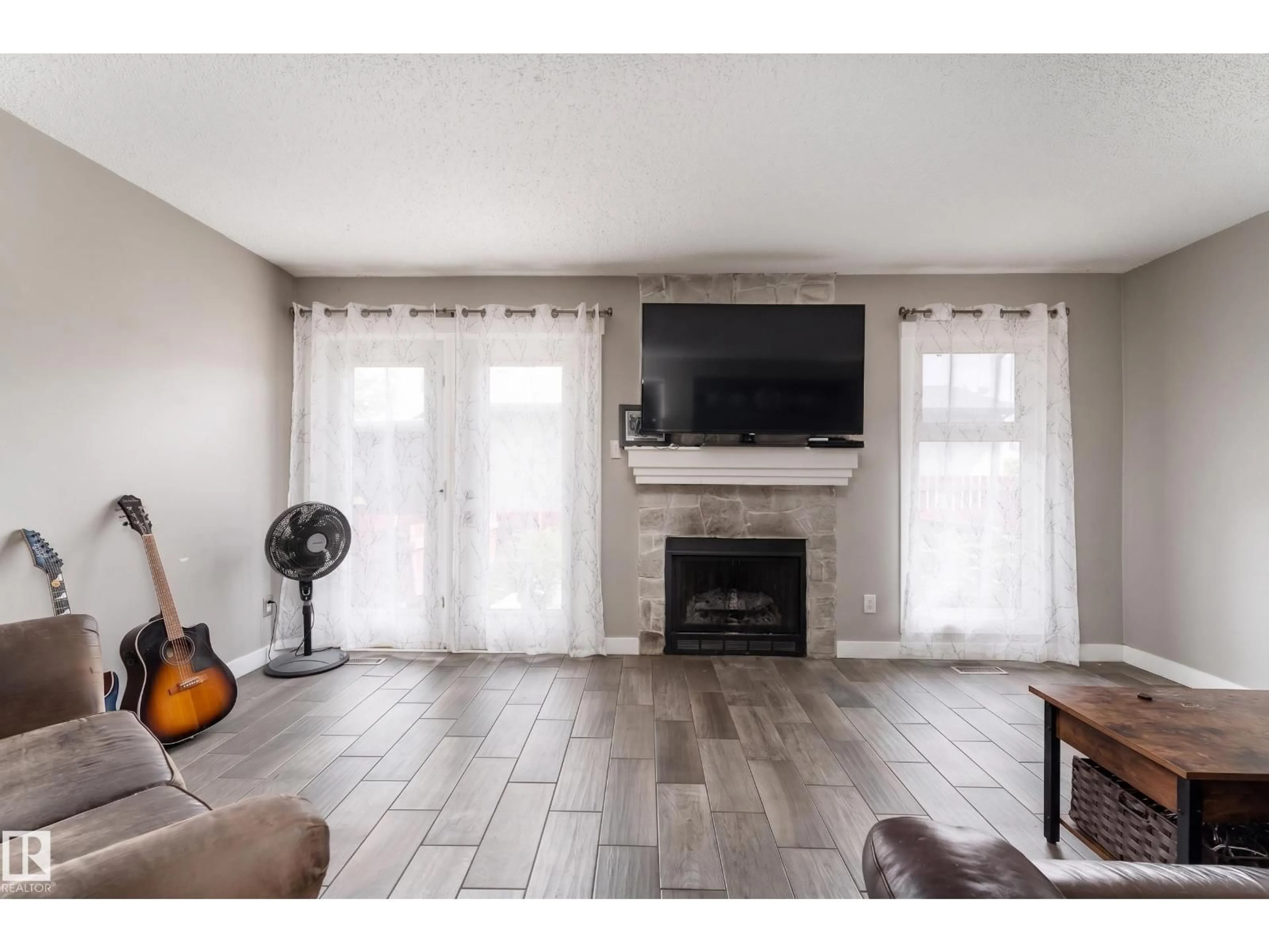 Living room with furniture, unknown for #2 - 4707 126 AV, Edmonton Alberta T5A4K4