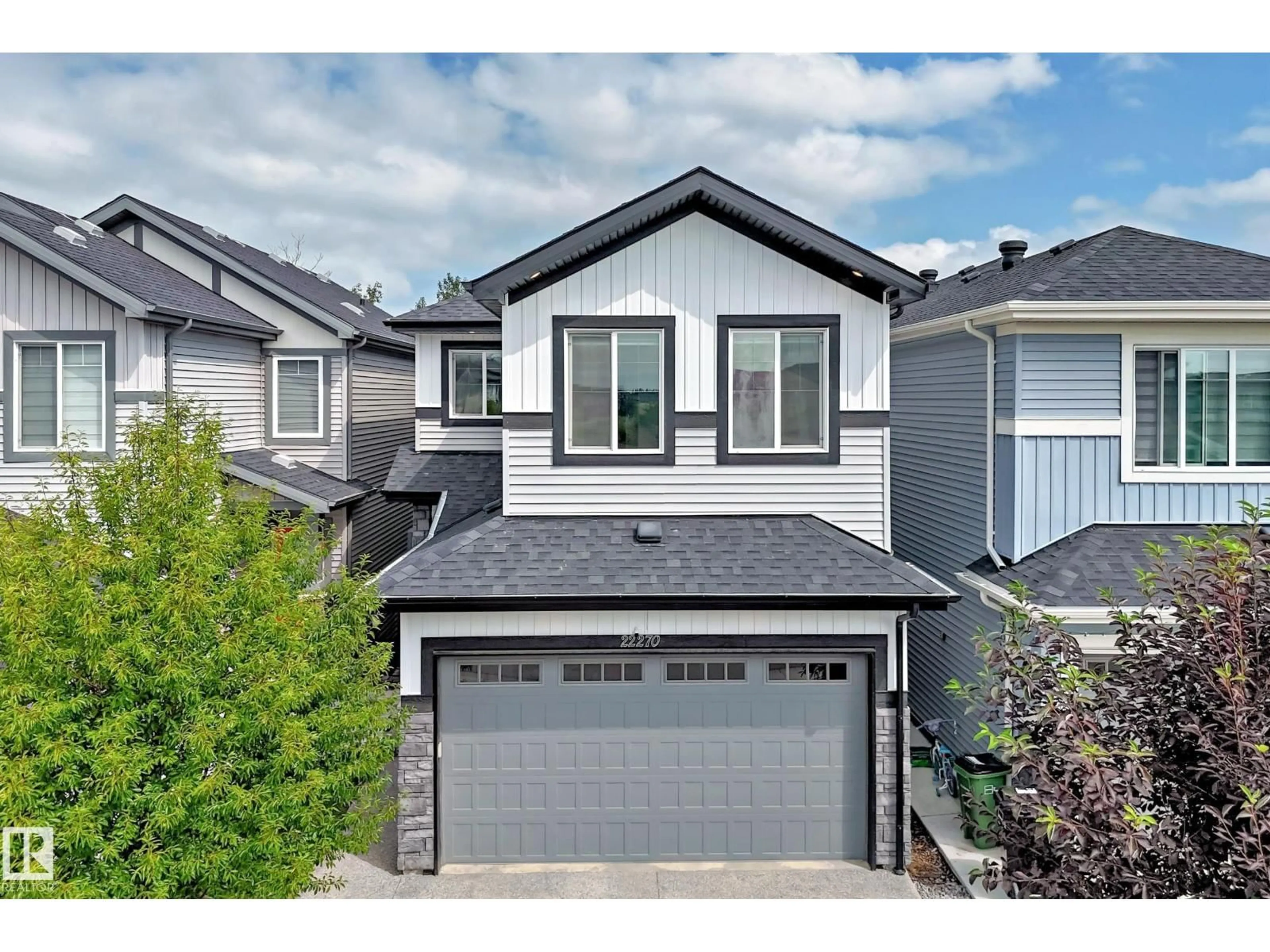 Home with vinyl exterior material, street for 22270 99A AV, Edmonton Alberta T5T7L8