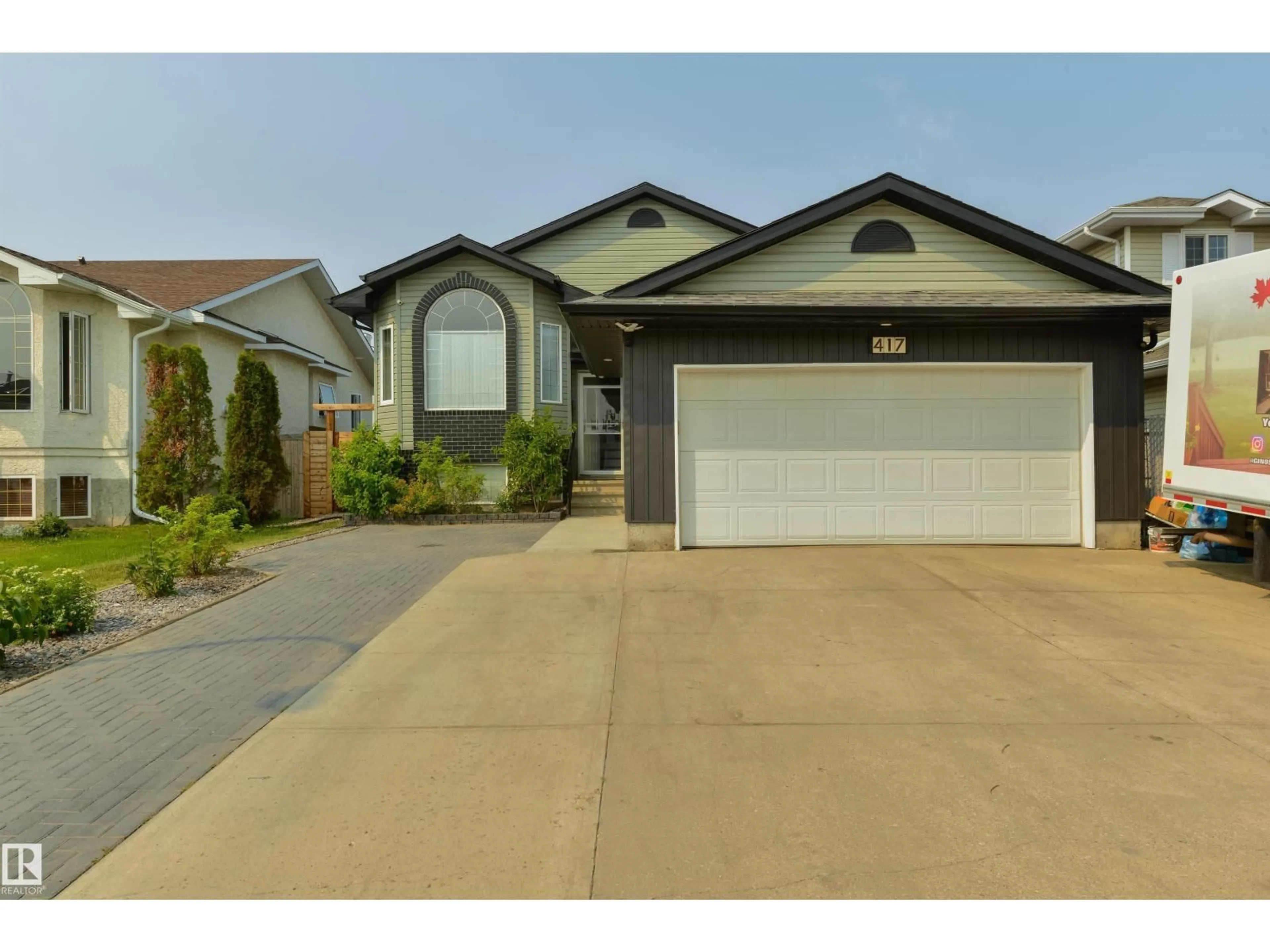Home with vinyl exterior material, street for 417 HOLLICK-KENYON RD, Edmonton Alberta T5Y2T9