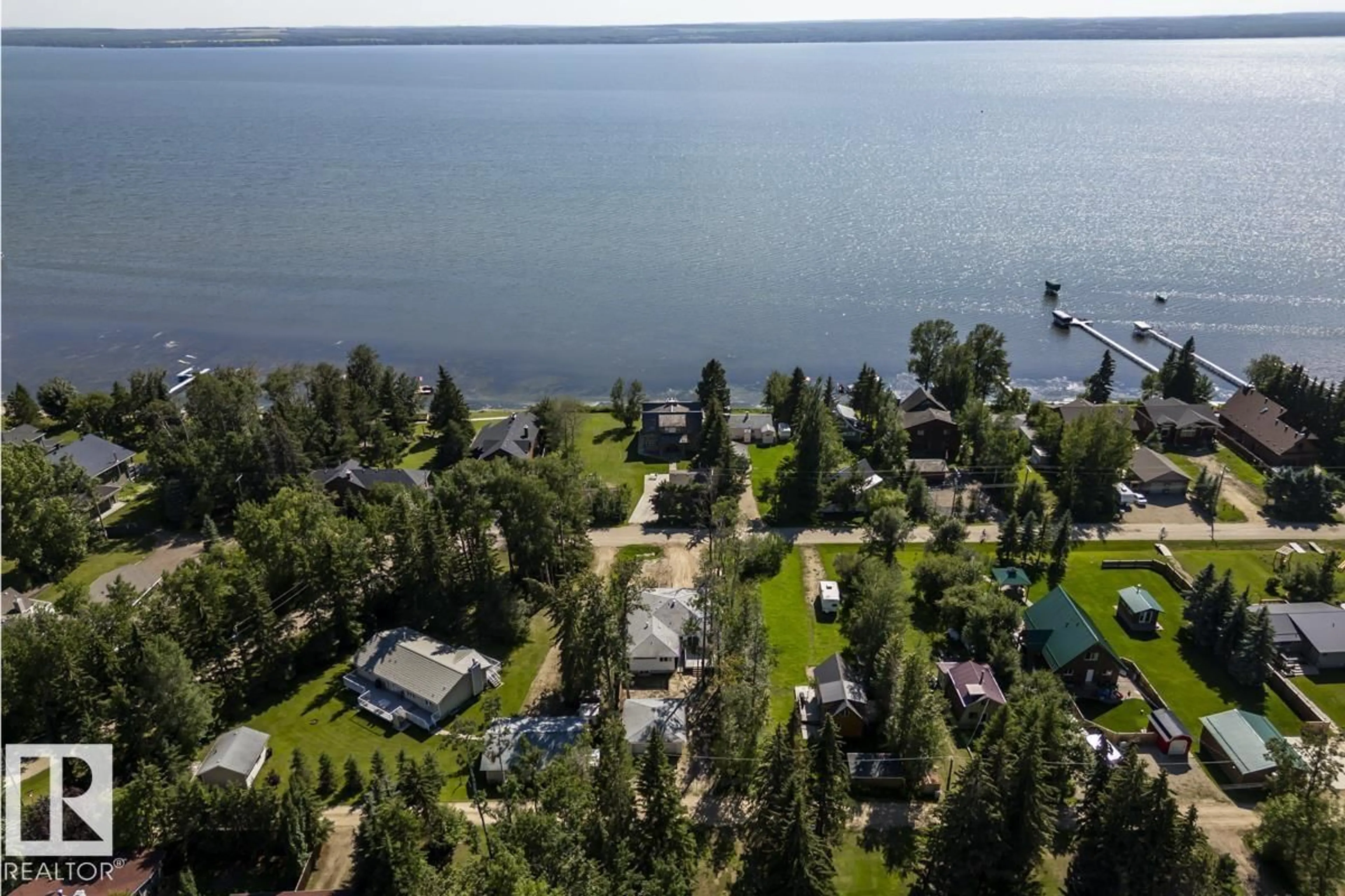A pic from outside/outdoor area/front of a property/back of a property/a pic from drone, water/lake/river/ocean view for B7 GOLDEN DAYS, Rural Leduc County Alberta T0C2P0