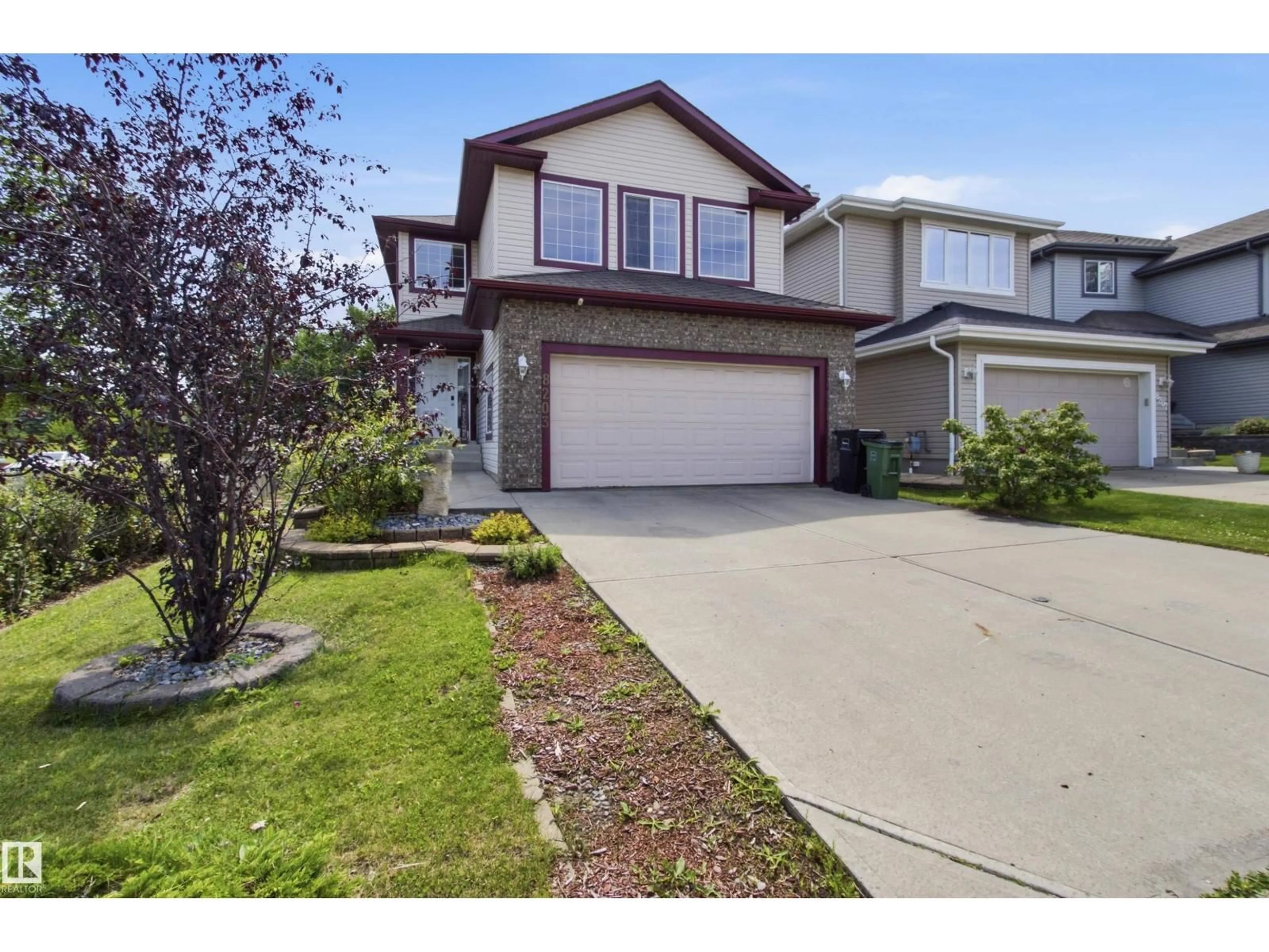 A pic from outside/outdoor area/front of a property/back of a property/a pic from drone, street for 8203 5 AV, Edmonton Alberta T6X1K5