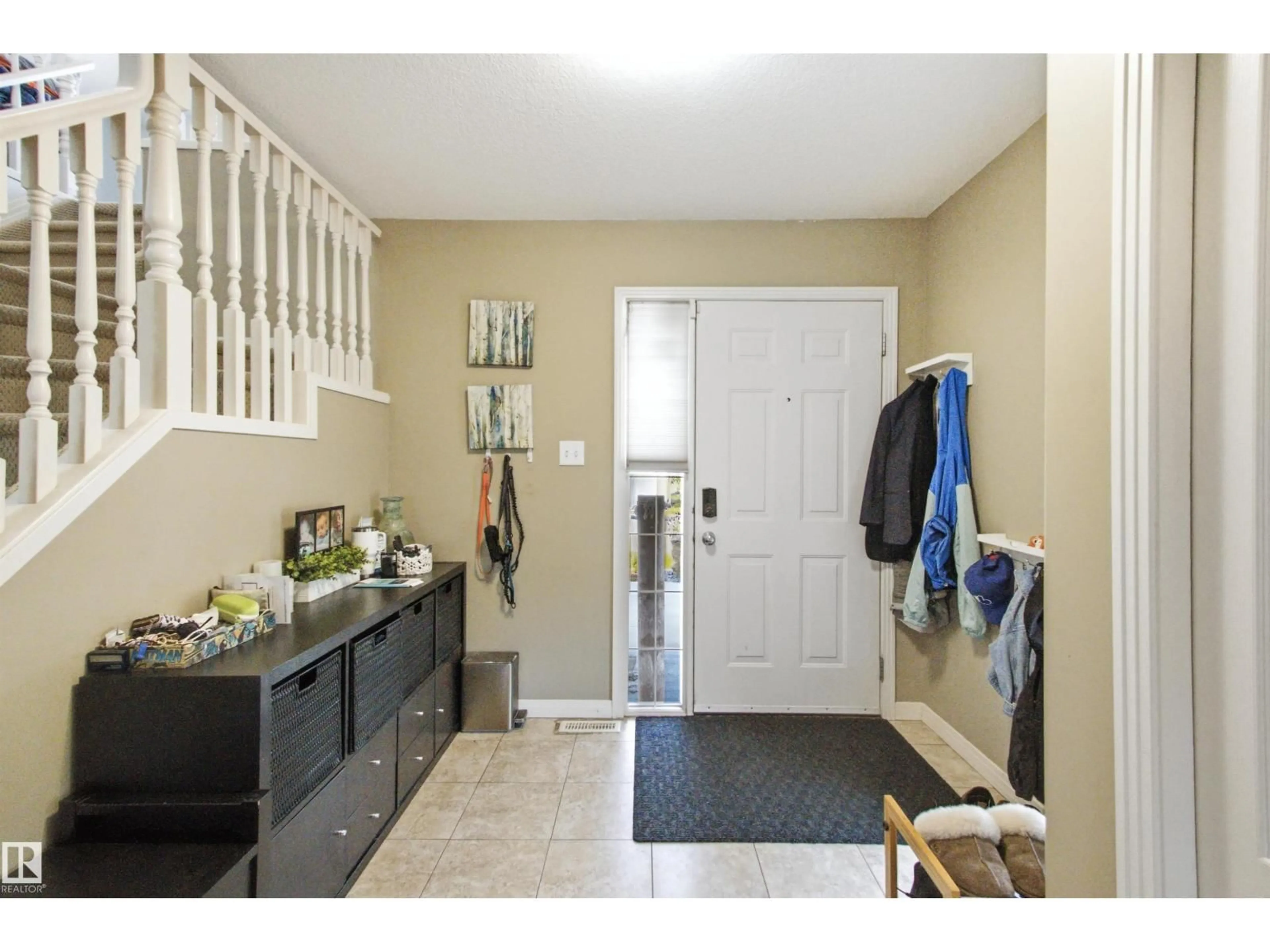 Indoor entryway for 8203 5 AV, Edmonton Alberta T6X1K5