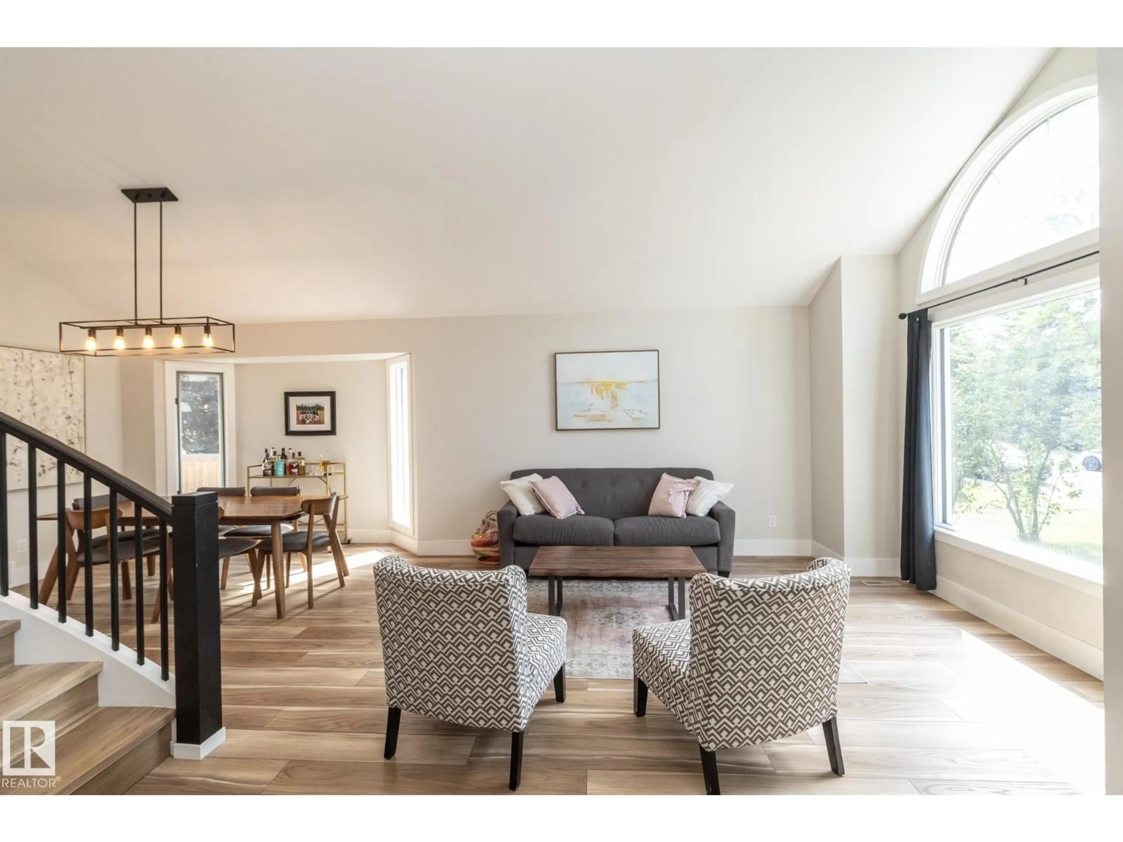 Living room with furniture, wood/laminate floor for 808 HEPBURN AV, Edmonton Alberta T6R1S8