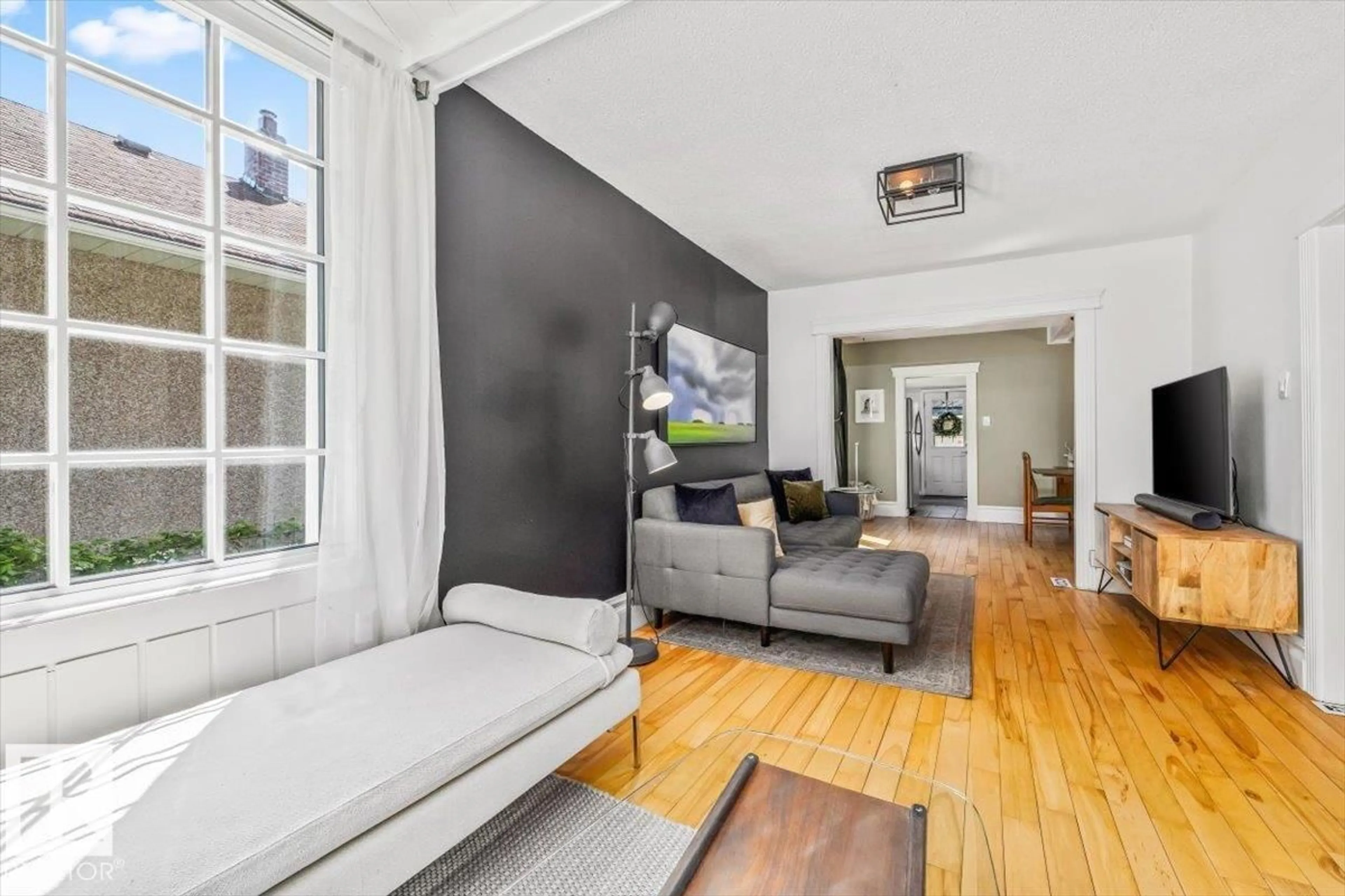 Living room with furniture, unknown for 11328 65 ST NW, Edmonton Alberta T5W4K6