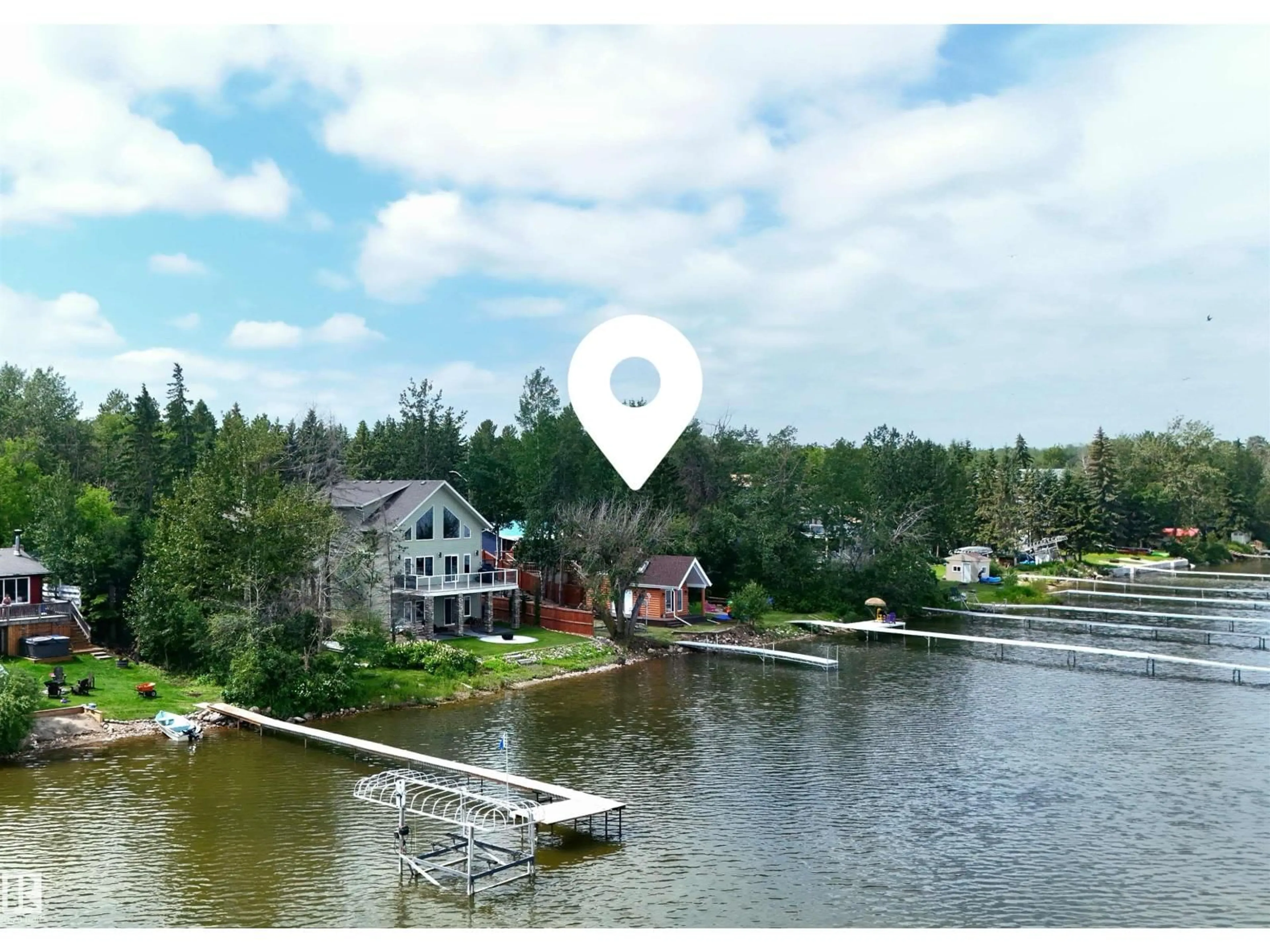 A pic from outside/outdoor area/front of a property/back of a property/a pic from drone, water/lake/river/ocean view for Viola BE - 38 462026 RR10, Rural Wetaskiwin County Alberta T0C2V0