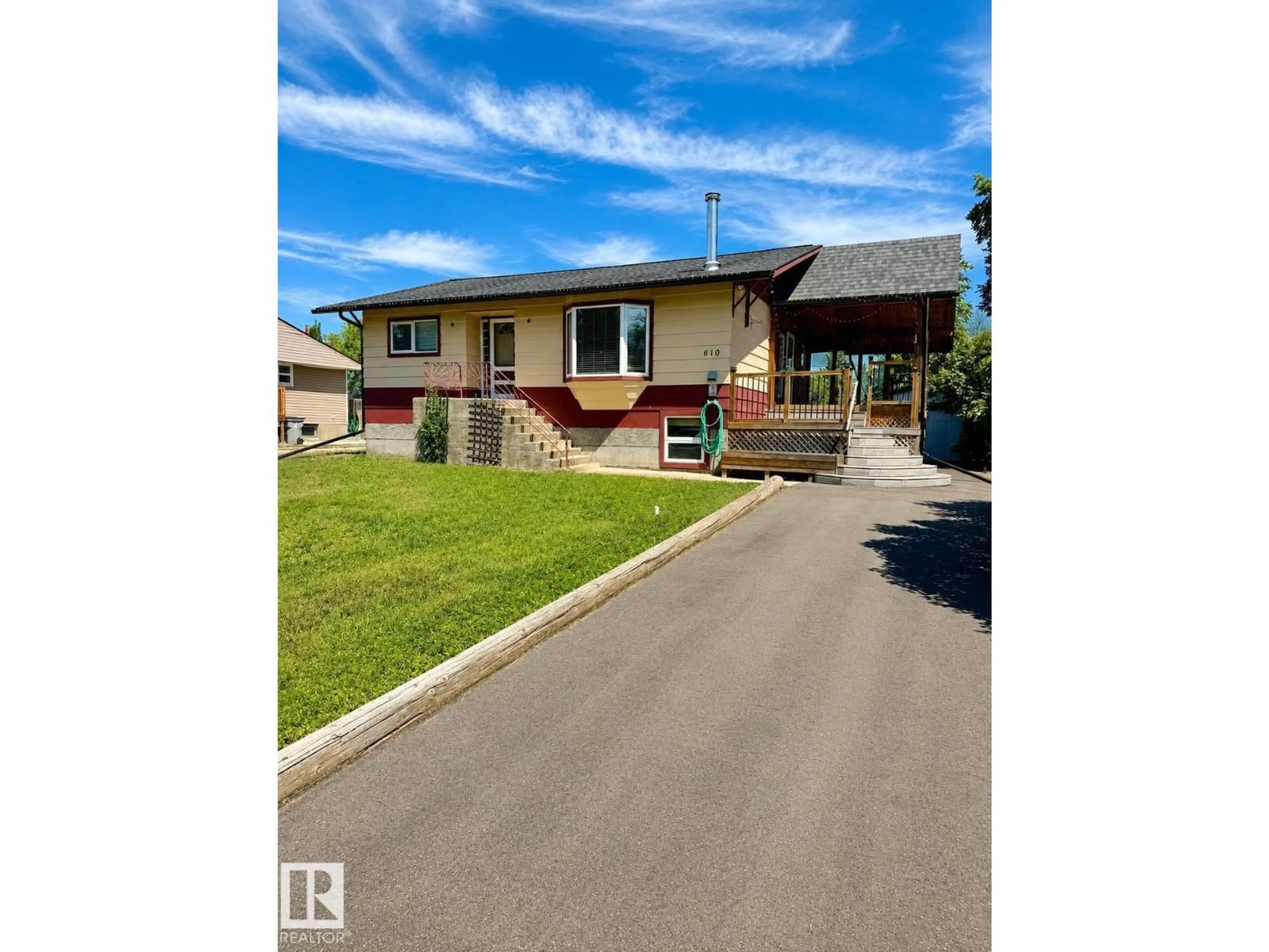 A pic from outside/outdoor area/front of a property/back of a property/a pic from drone, street for 610 8 AV, Wainwright Alberta T9W1B4