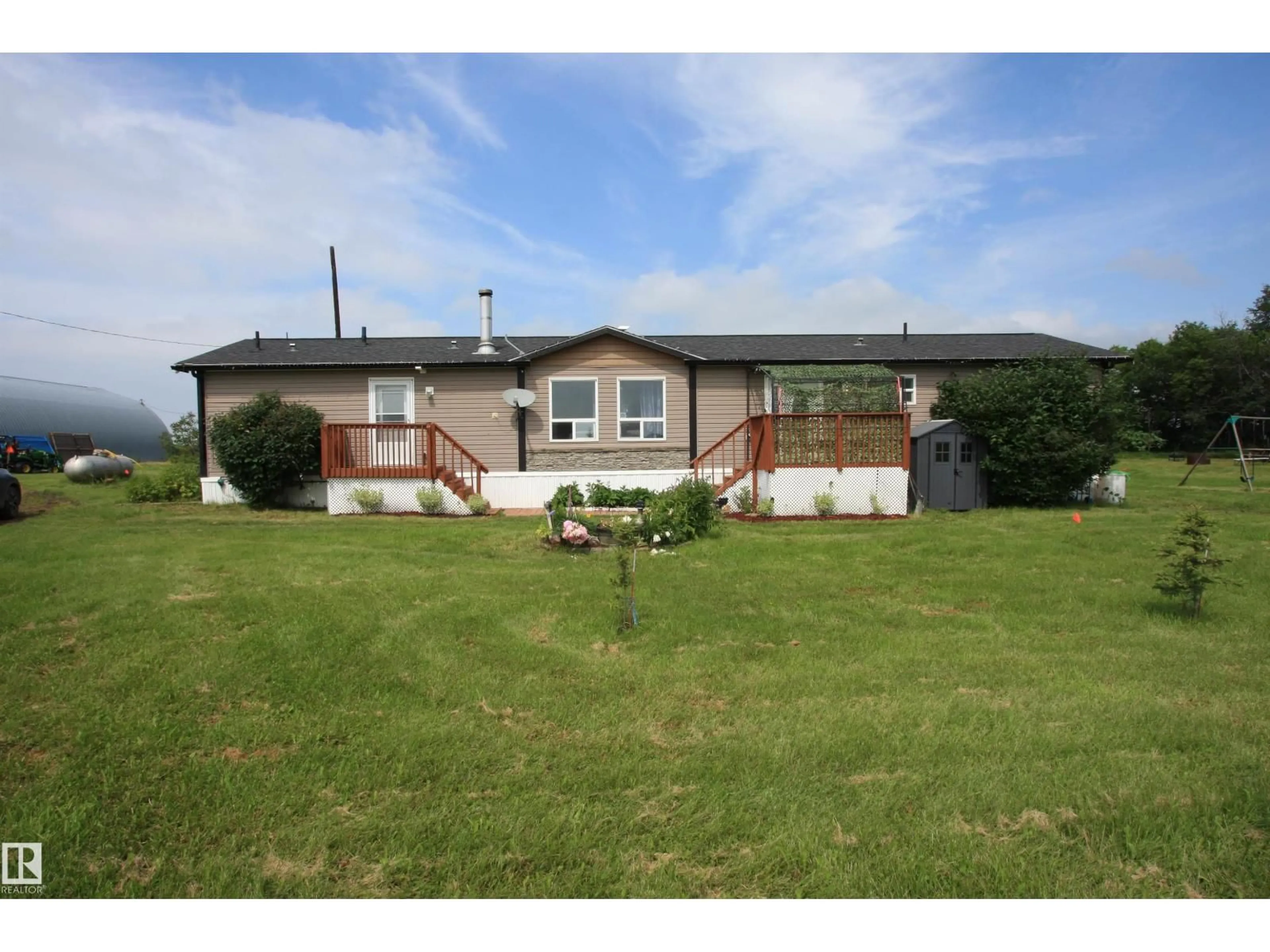 A pic from outside/outdoor area/front of a property/back of a property/a pic from drone, unknown for 27418 TWP ROAD 552, Rural Sturgeon County Alberta T8R2E8