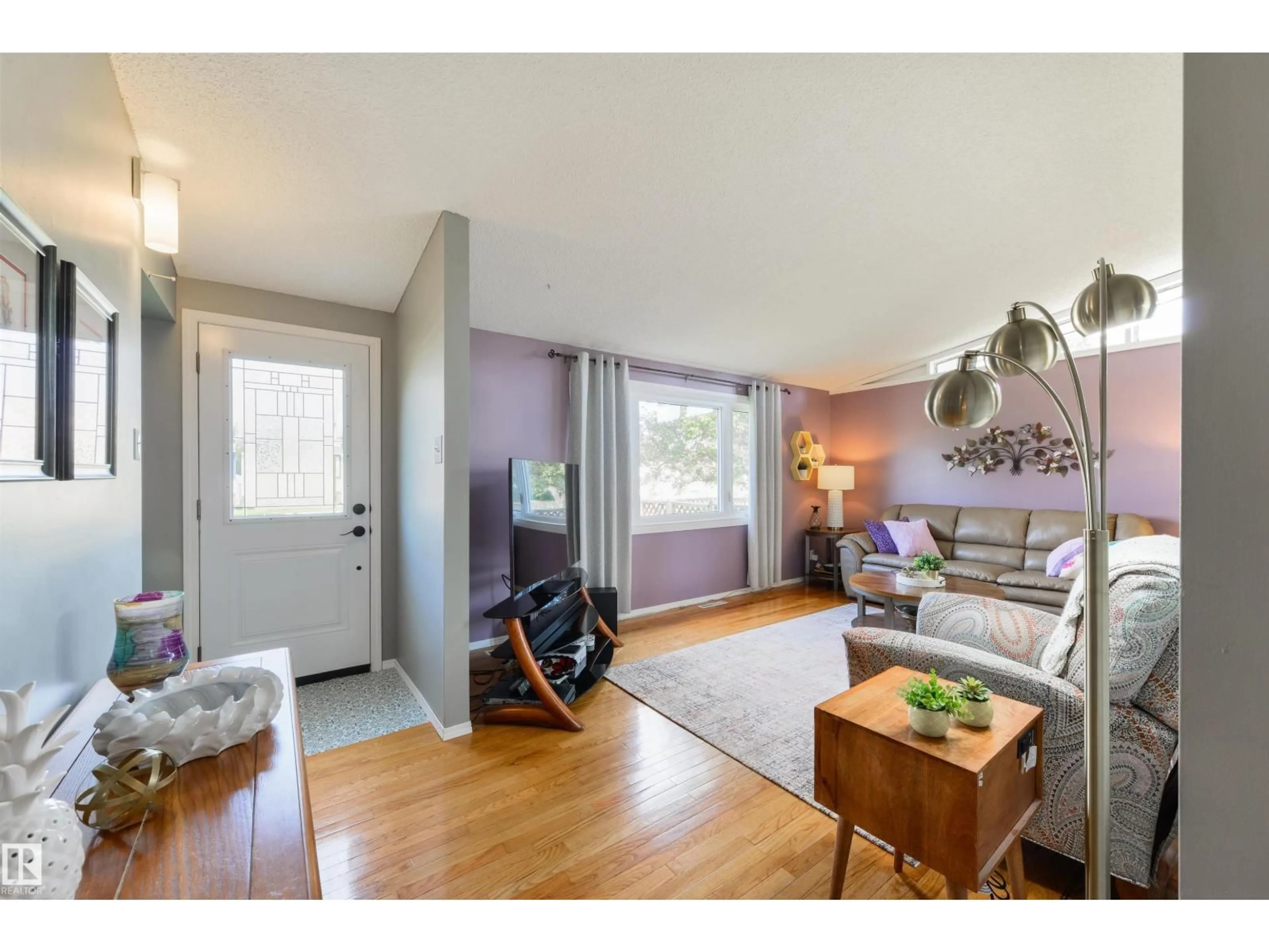 Living room with furniture, wood/laminate floor for 4 BLAIRMORE ST, Spruce Grove Alberta T7X1J3
