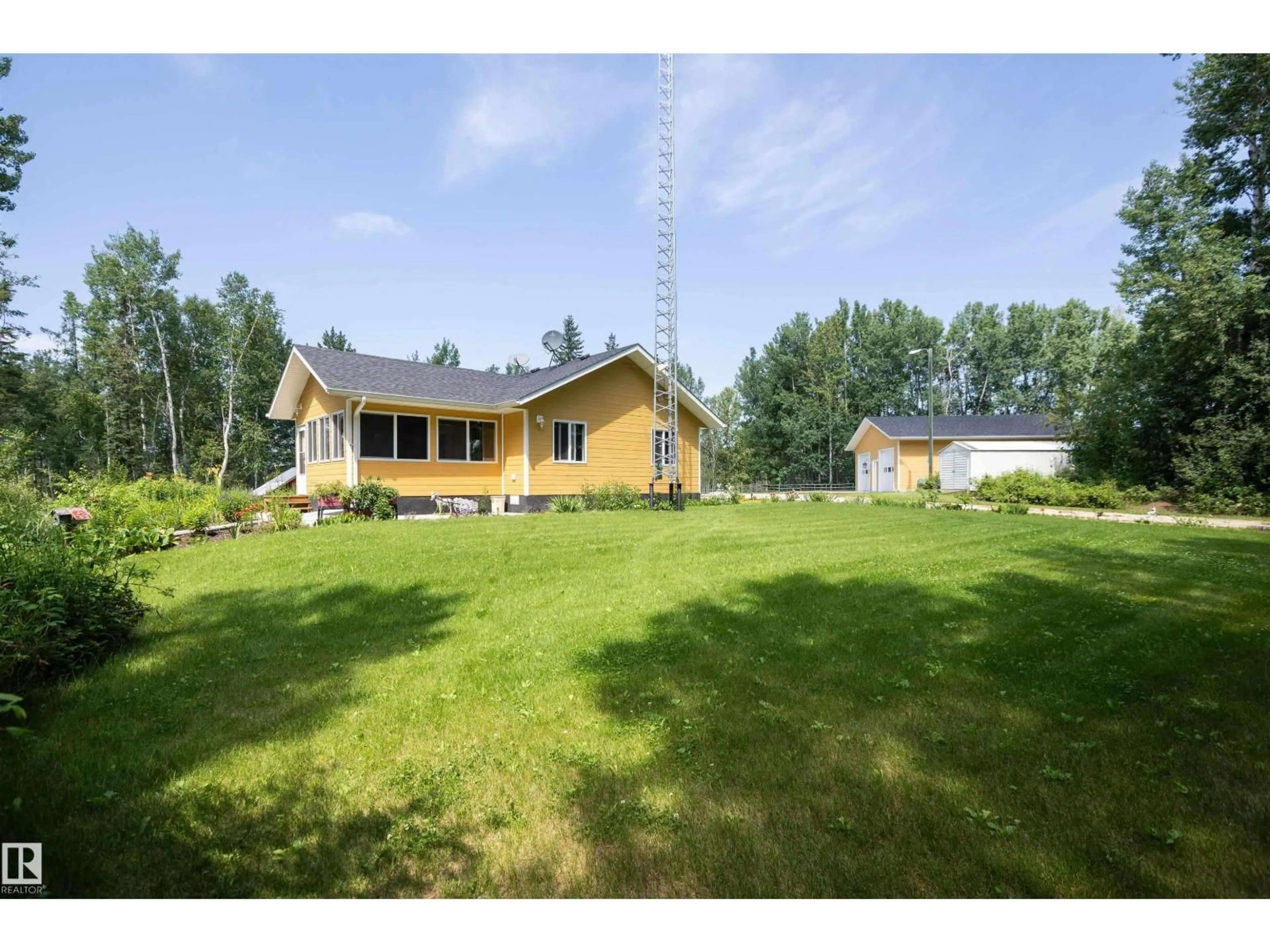 A pic from outside/outdoor area/front of a property/back of a property/a pic from drone, unknown for 60520 RGE RD 62A, Rural Barrhead County Alberta T0G1A0