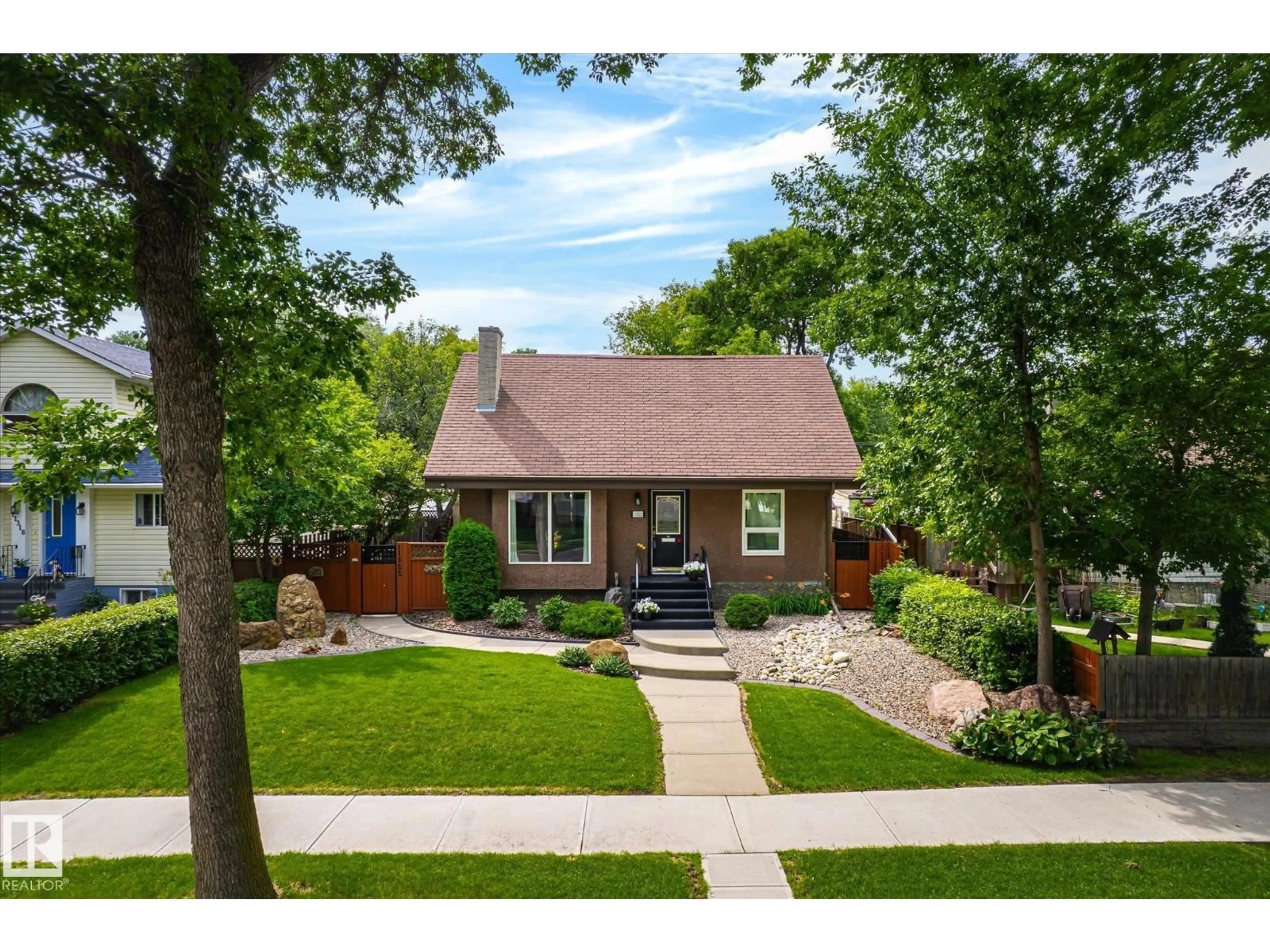 Home with brick exterior material, street for NW - 11322 56 ST, Edmonton Alberta T5W3S4