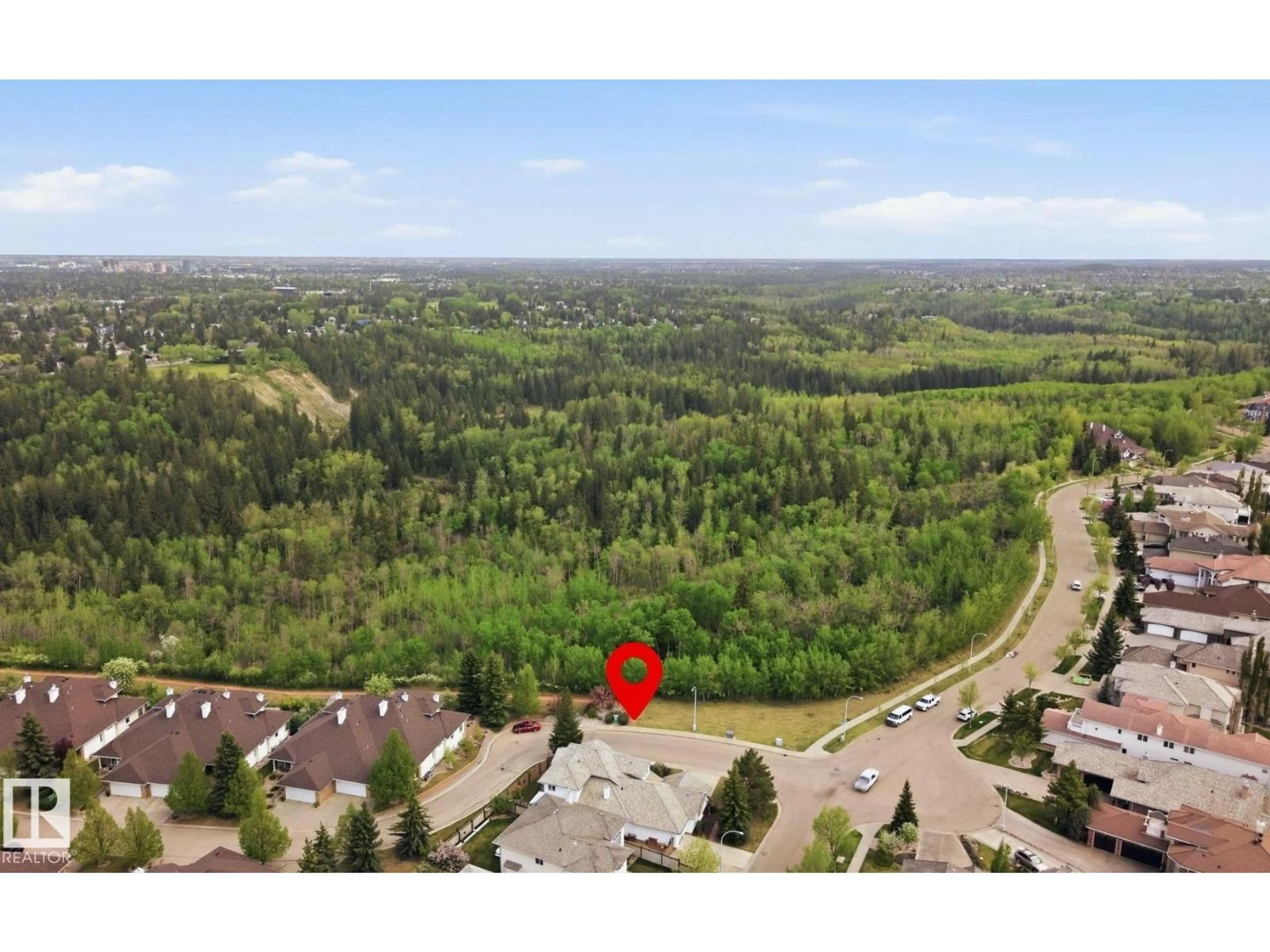 A pic from outside/outdoor area/front of a property/back of a property/a pic from drone, forest/trees view for 777 BUTTERWORTH DR, Edmonton Alberta T6R2P6