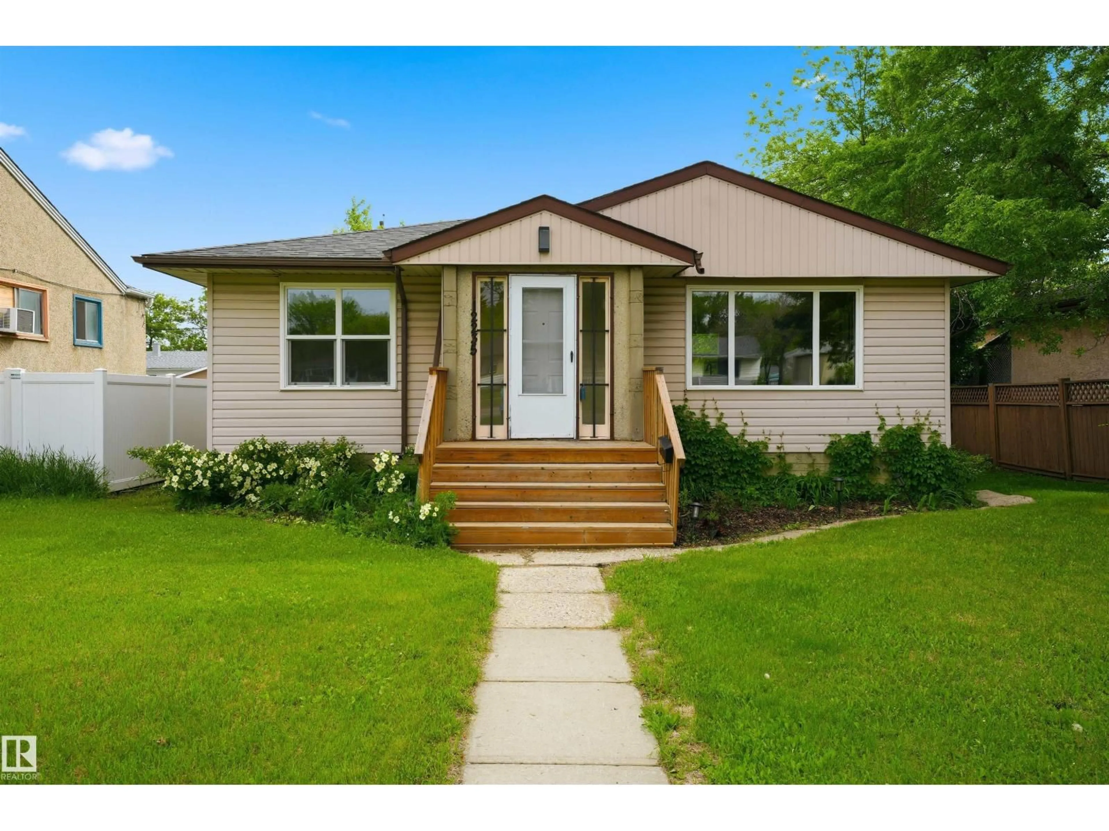 Home with vinyl exterior material, street for 12235 ST ALBERT TR, Edmonton Alberta T5L4G7