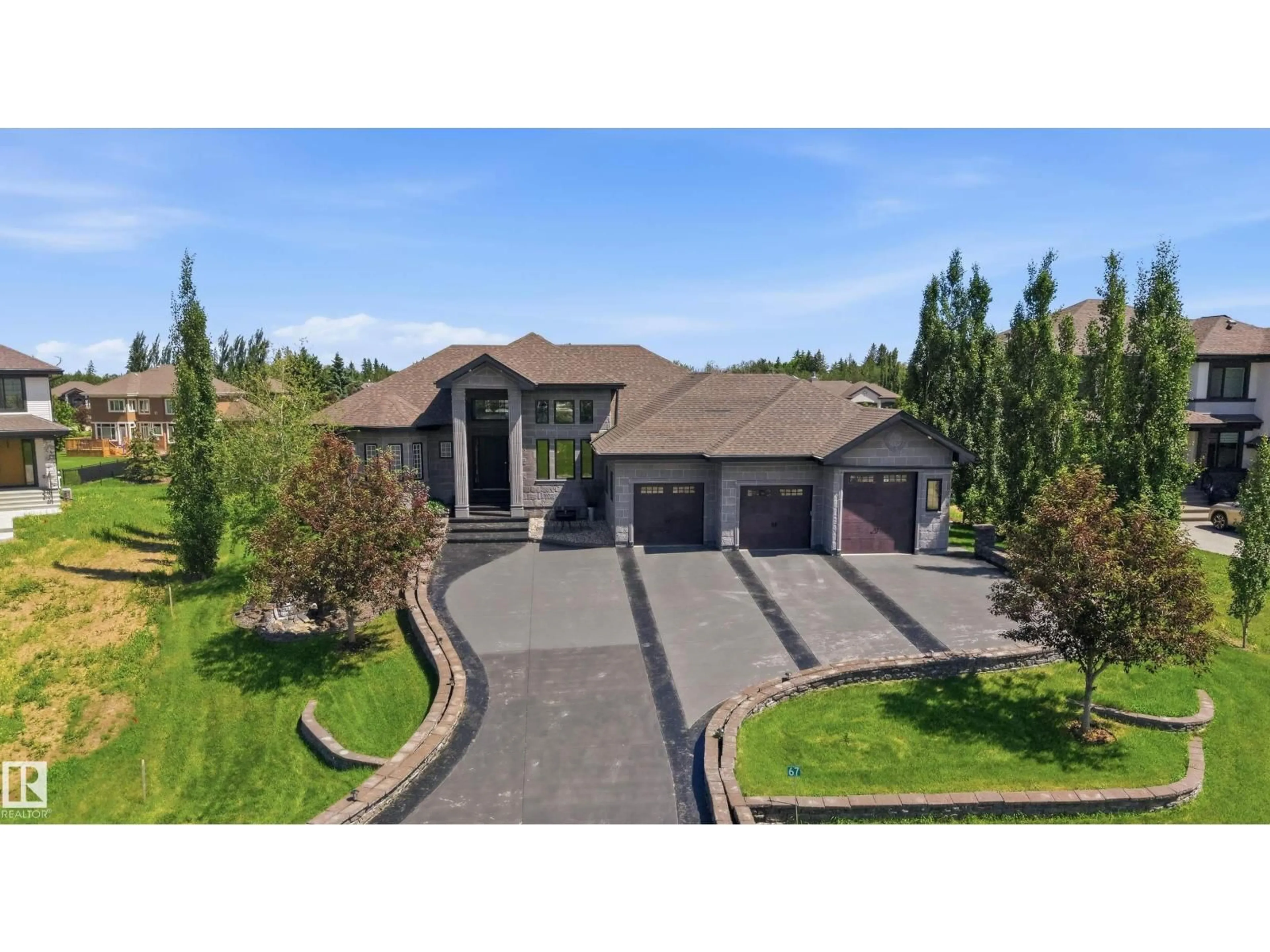 A pic from outside/outdoor area/front of a property/back of a property/a pic from drone, street for 67 TWP ROAD 532 A, Rural Parkland County Alberta T7Y1A1