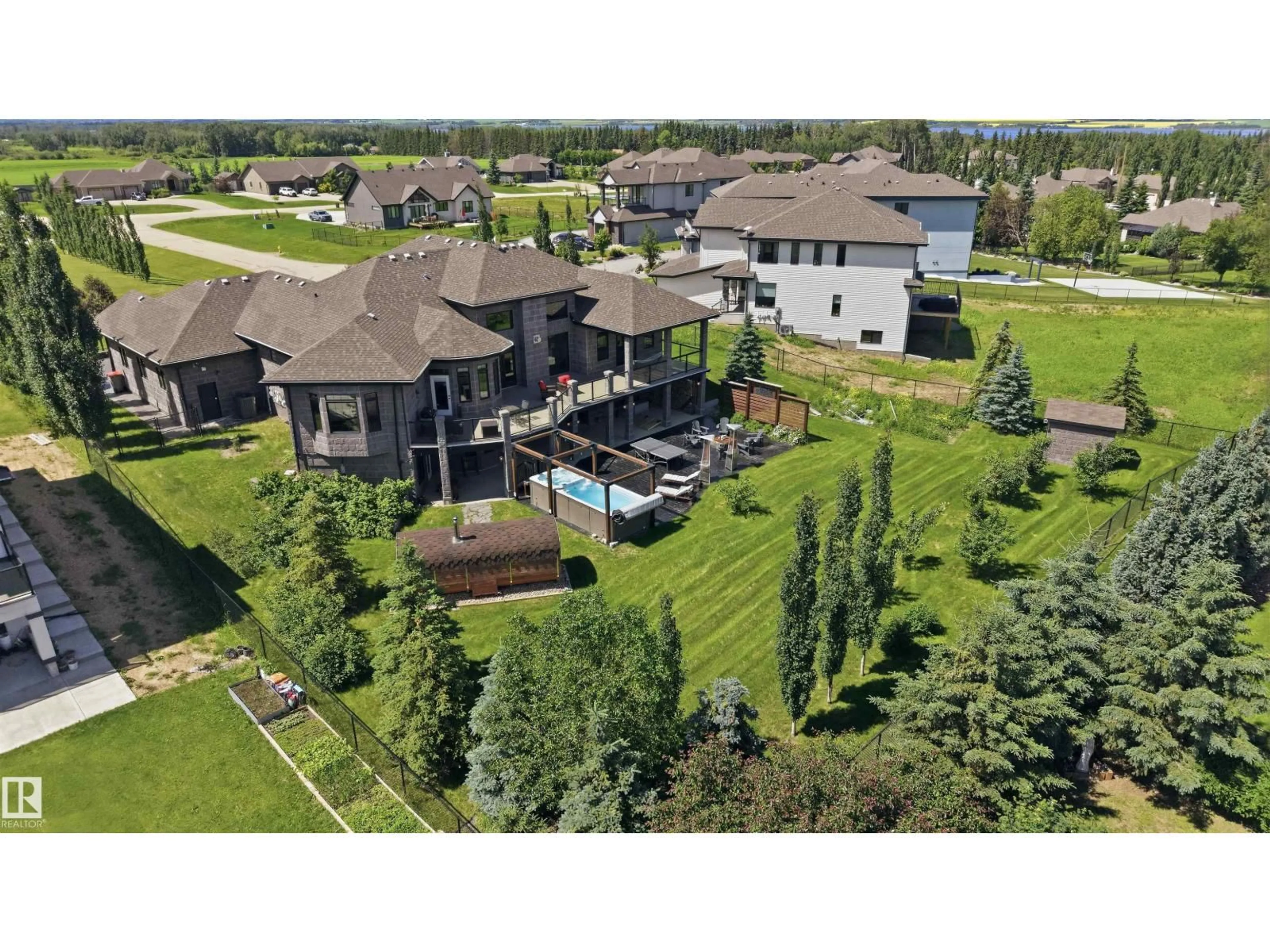 A pic from outside/outdoor area/front of a property/back of a property/a pic from drone, unknown for 67 TWP ROAD 532 A, Rural Parkland County Alberta T7Y1A1