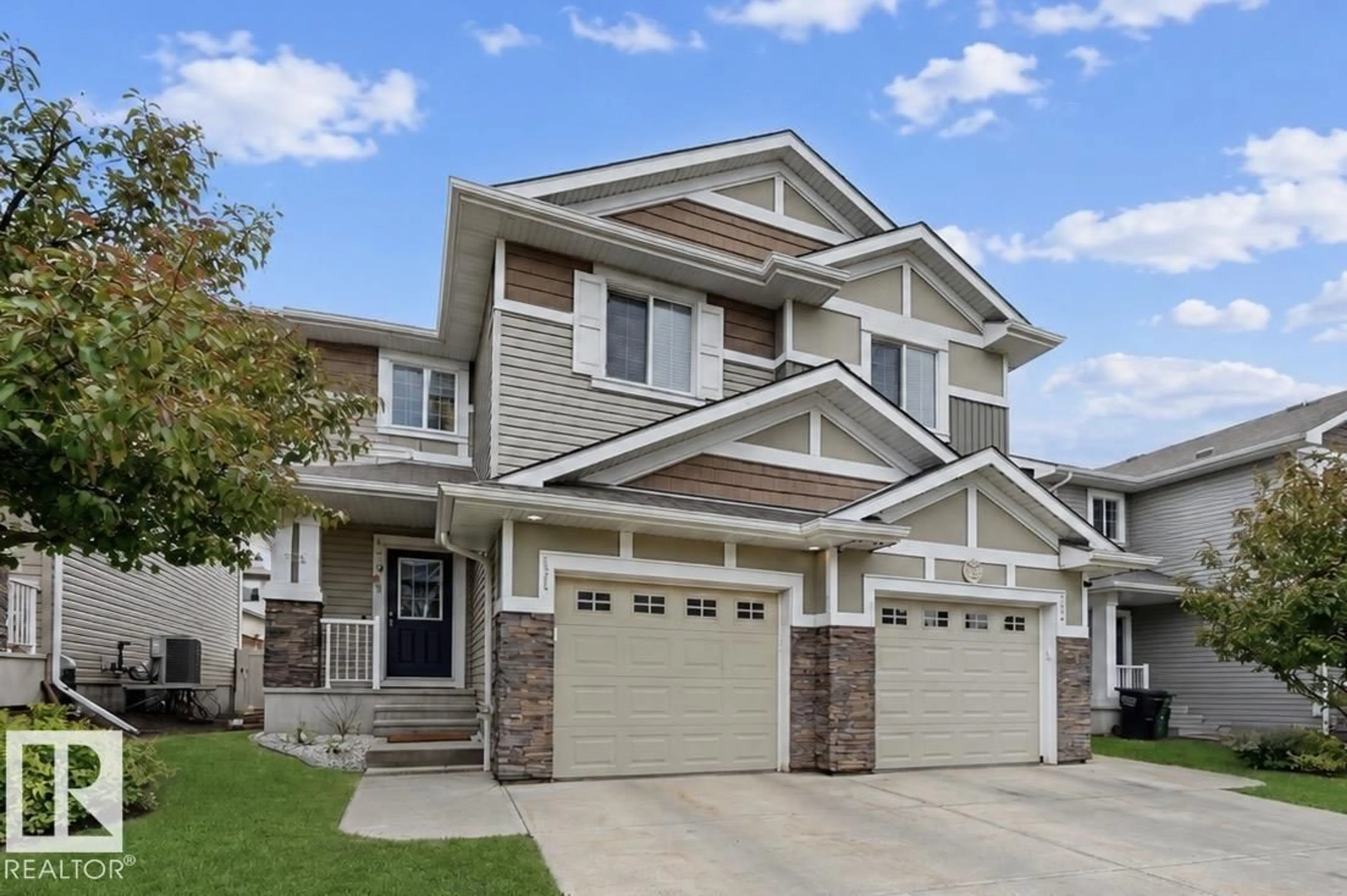 Home with vinyl exterior material, street for #11 - 5317 3 AV SW, Edmonton Alberta T6X0W7
