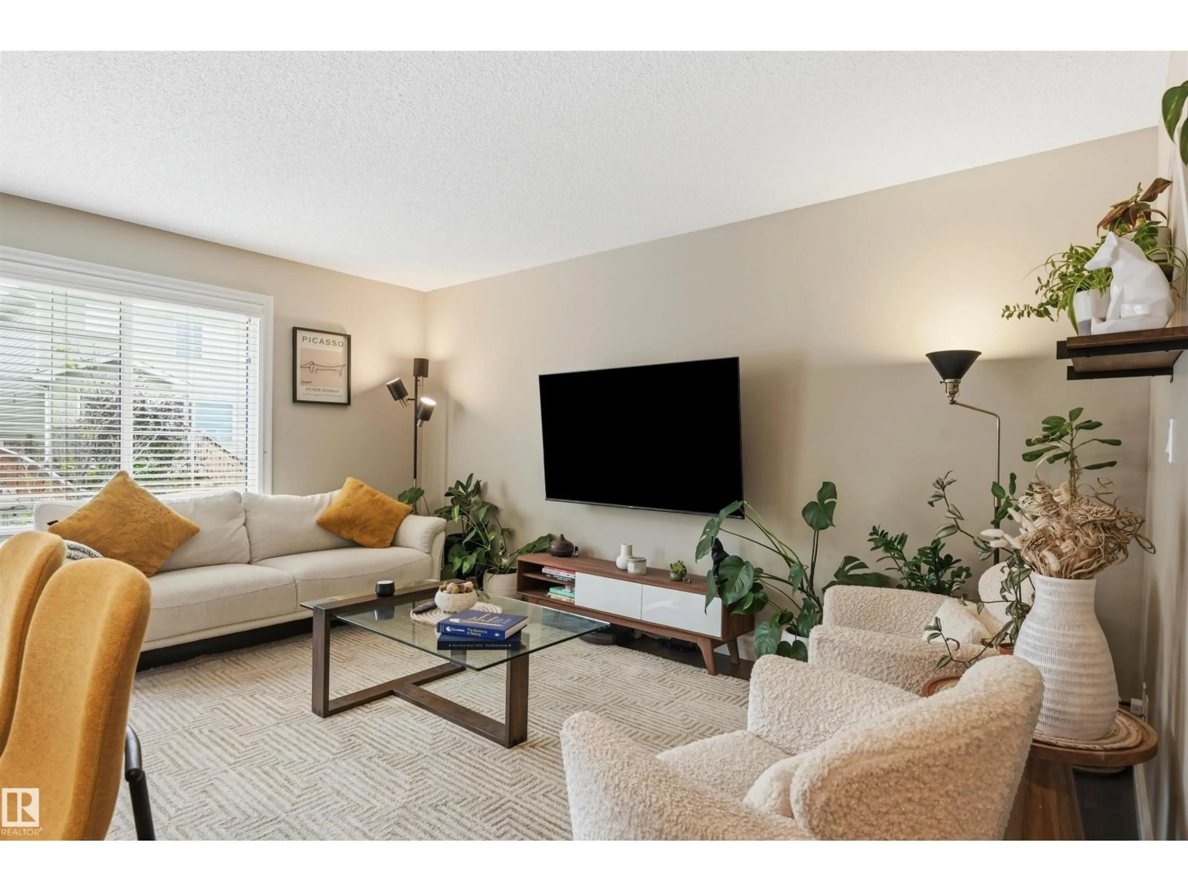 Living room with furniture, unknown for #11 - 5317 3 AV SW, Edmonton Alberta T6X0W7