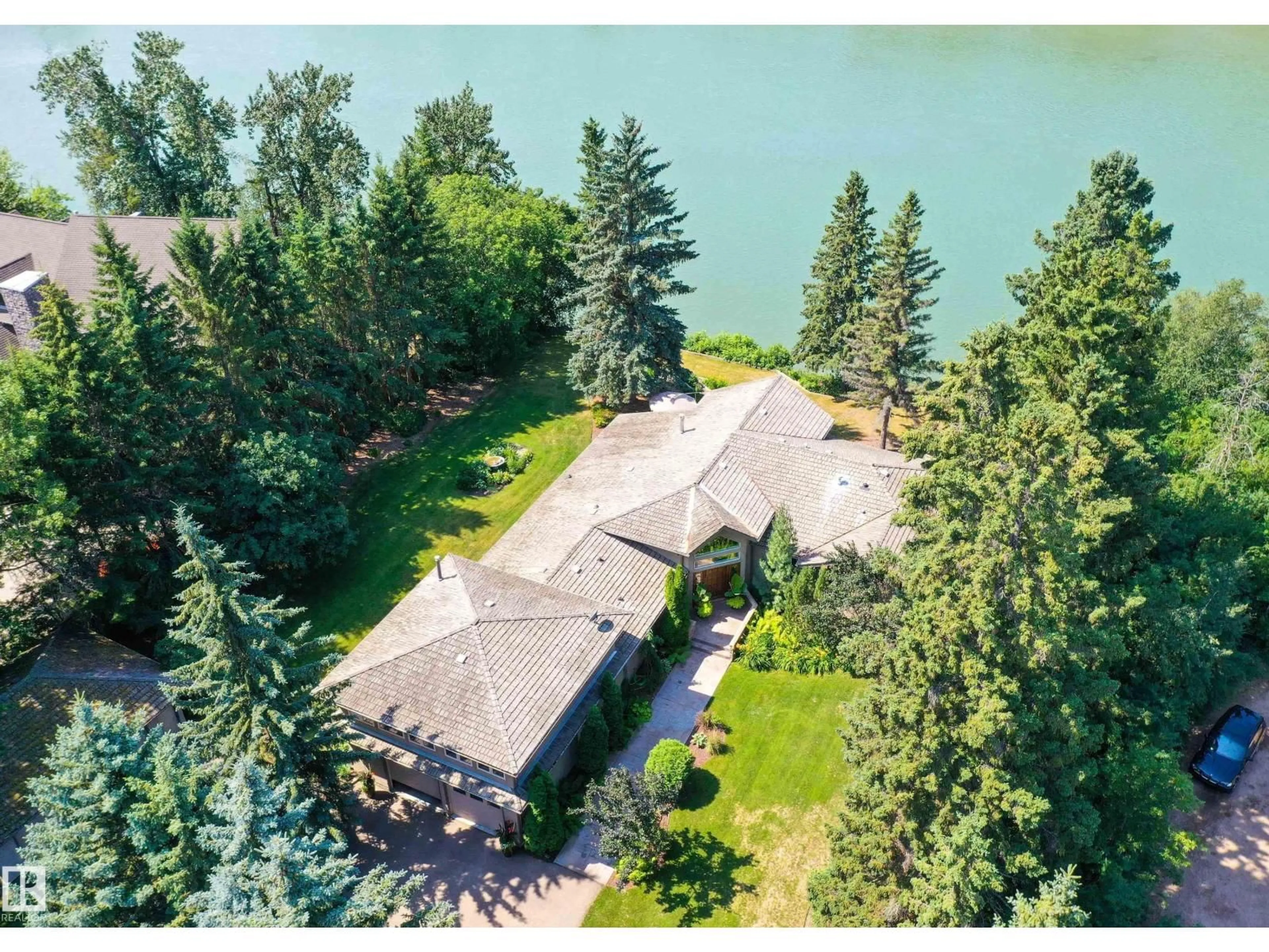 A pic from outside/outdoor area/front of a property/back of a property/a pic from drone, water/lake/river/ocean view for 15625 WHITEMUD RD, Edmonton Alberta T6H4N5