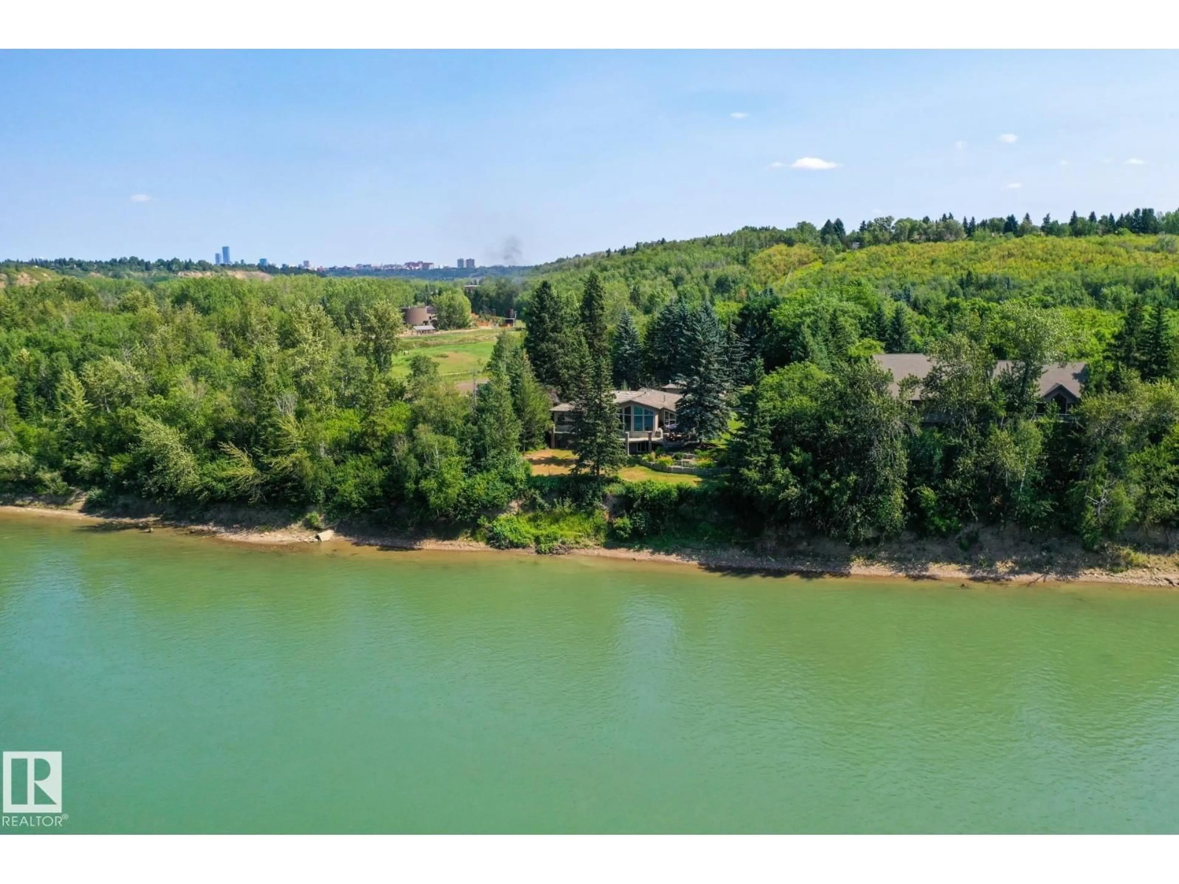 A pic from outside/outdoor area/front of a property/back of a property/a pic from drone, water/lake/river/ocean view for 15625 WHITEMUD RD, Edmonton Alberta T6H4N5
