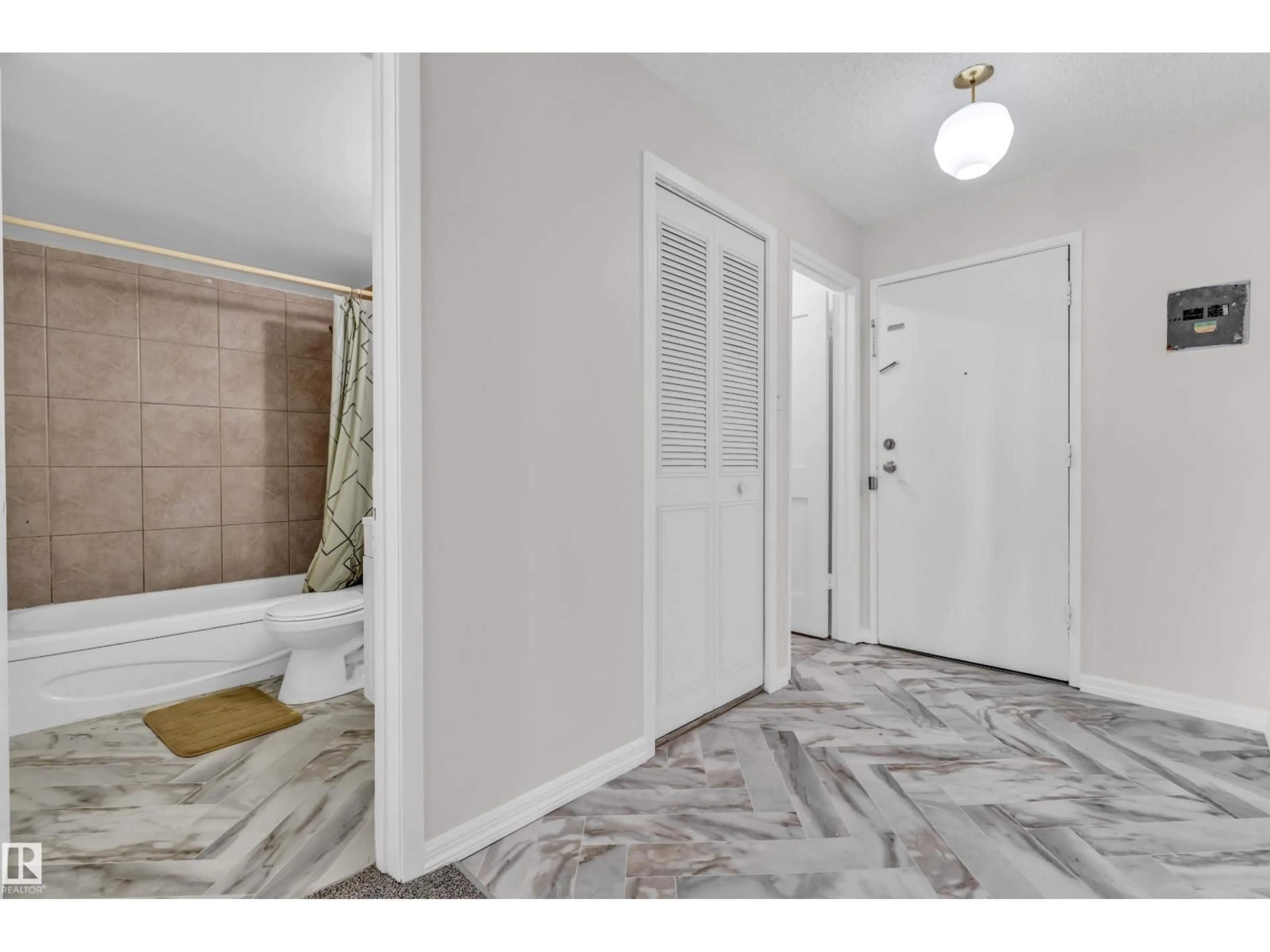 Indoor entryway for 105 - 10725 111ST NW, Edmonton Alberta T5H3G2