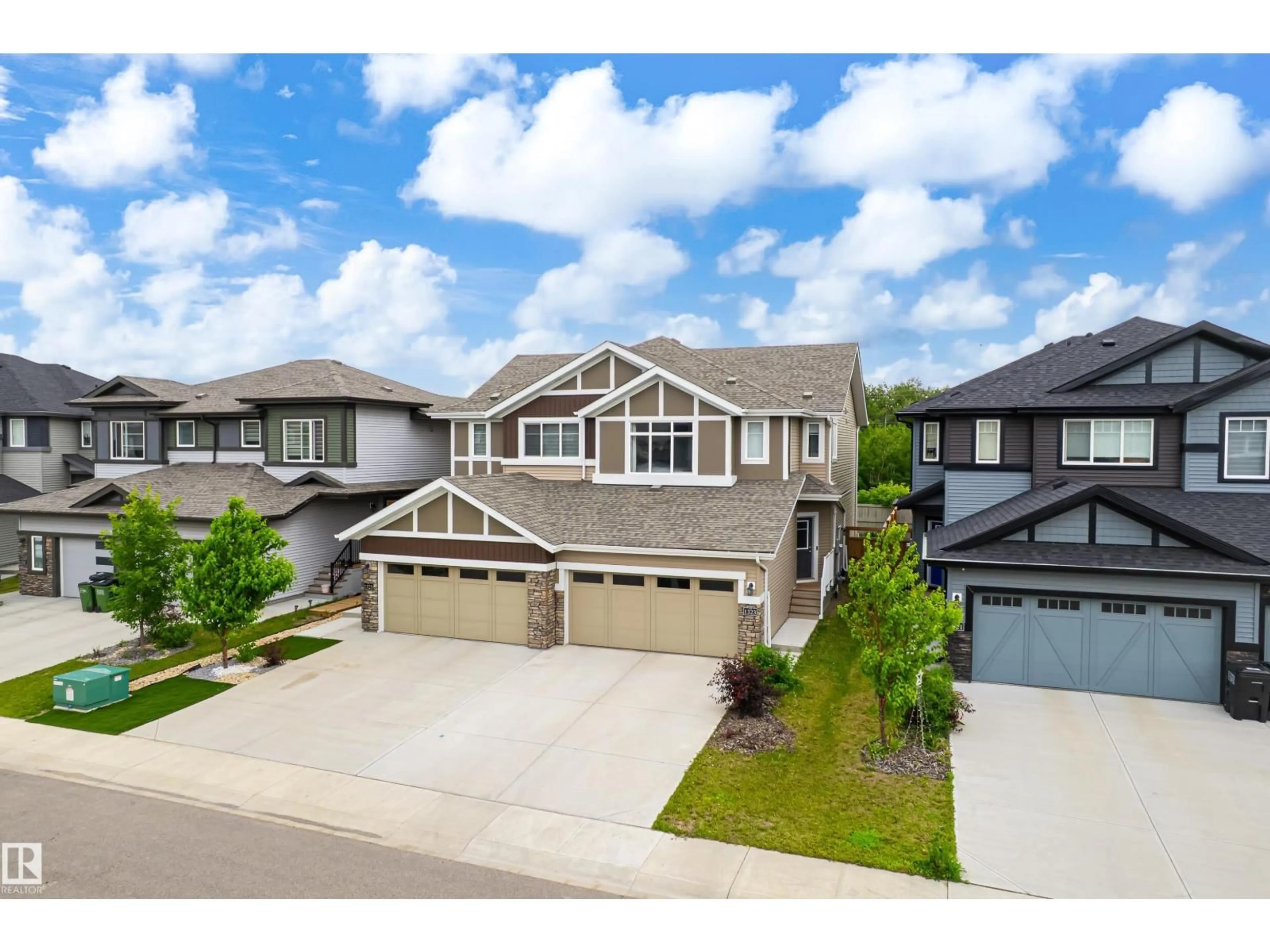 A pic from outside/outdoor area/front of a property/back of a property/a pic from drone, street for 1323 ERKER CR, Edmonton Alberta T6M2N5