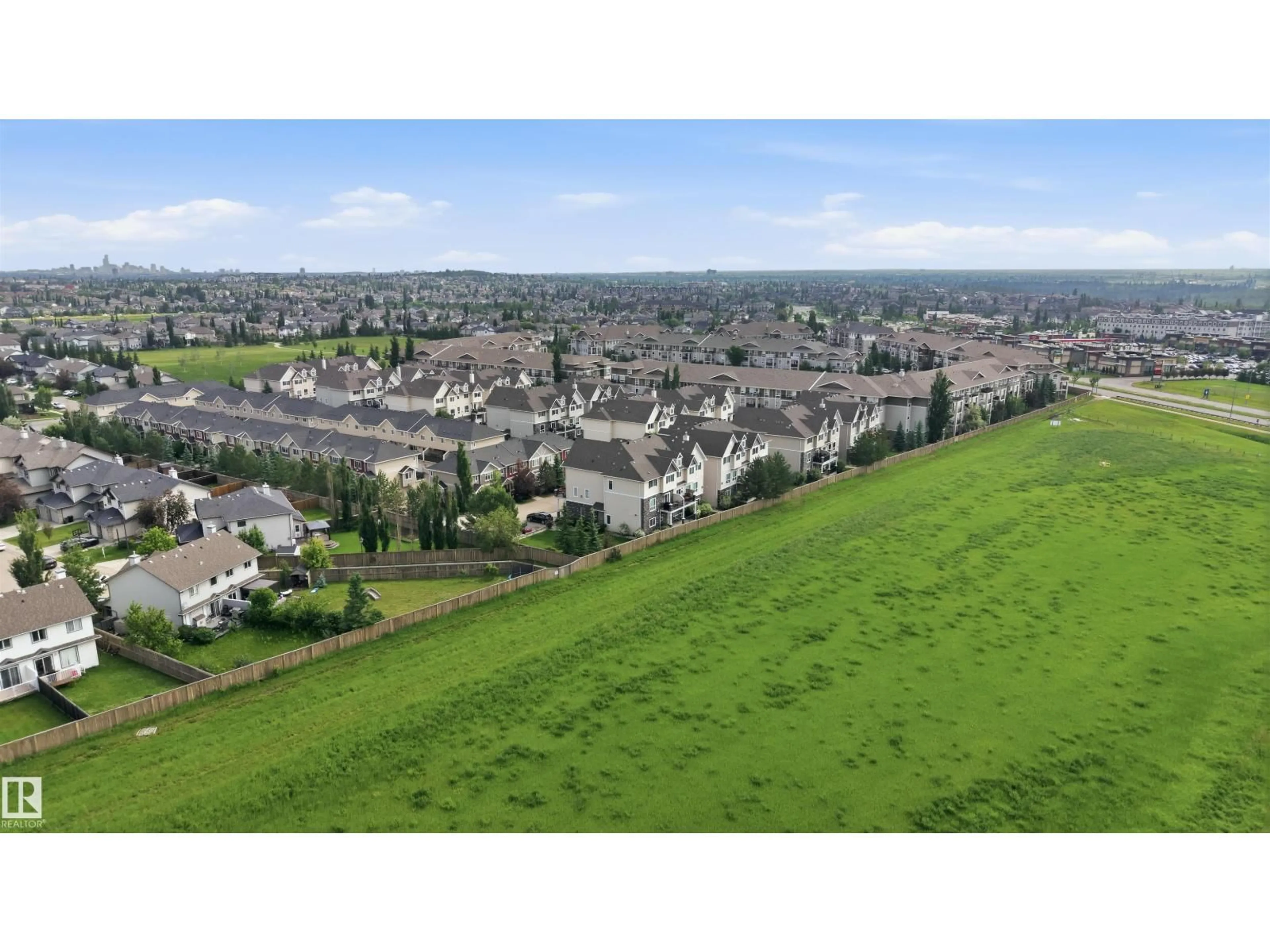 A pic from outside/outdoor area/front of a property/back of a property/a pic from drone, mountain view for 7293 - 117 SOUTH TERWILLEGAR DR, Edmonton Alberta T6R0N5