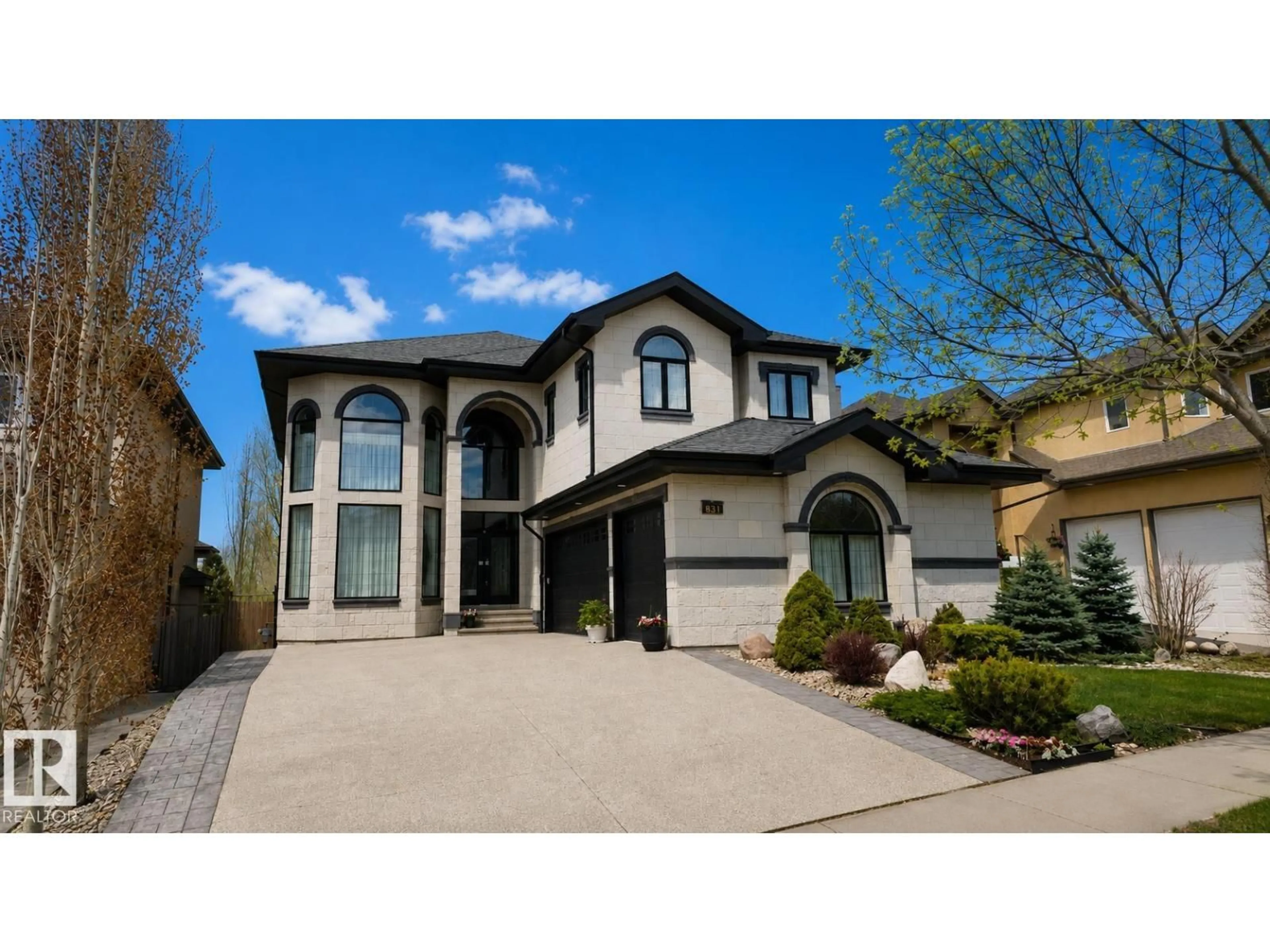 Home with vinyl exterior material, street for 831 HOLLANDS LD, Edmonton Alberta T6R3S9