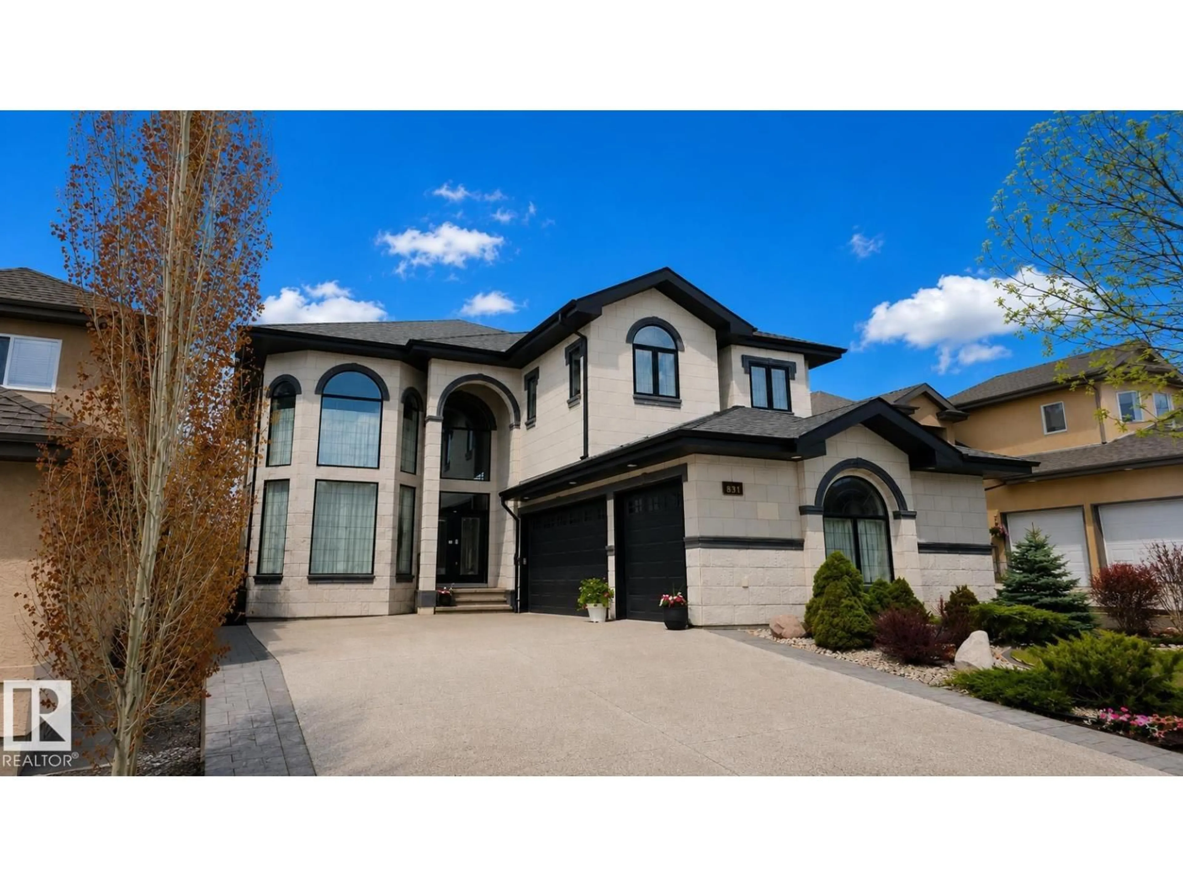 Home with vinyl exterior material, street for 831 HOLLANDS LD, Edmonton Alberta T6R3S9