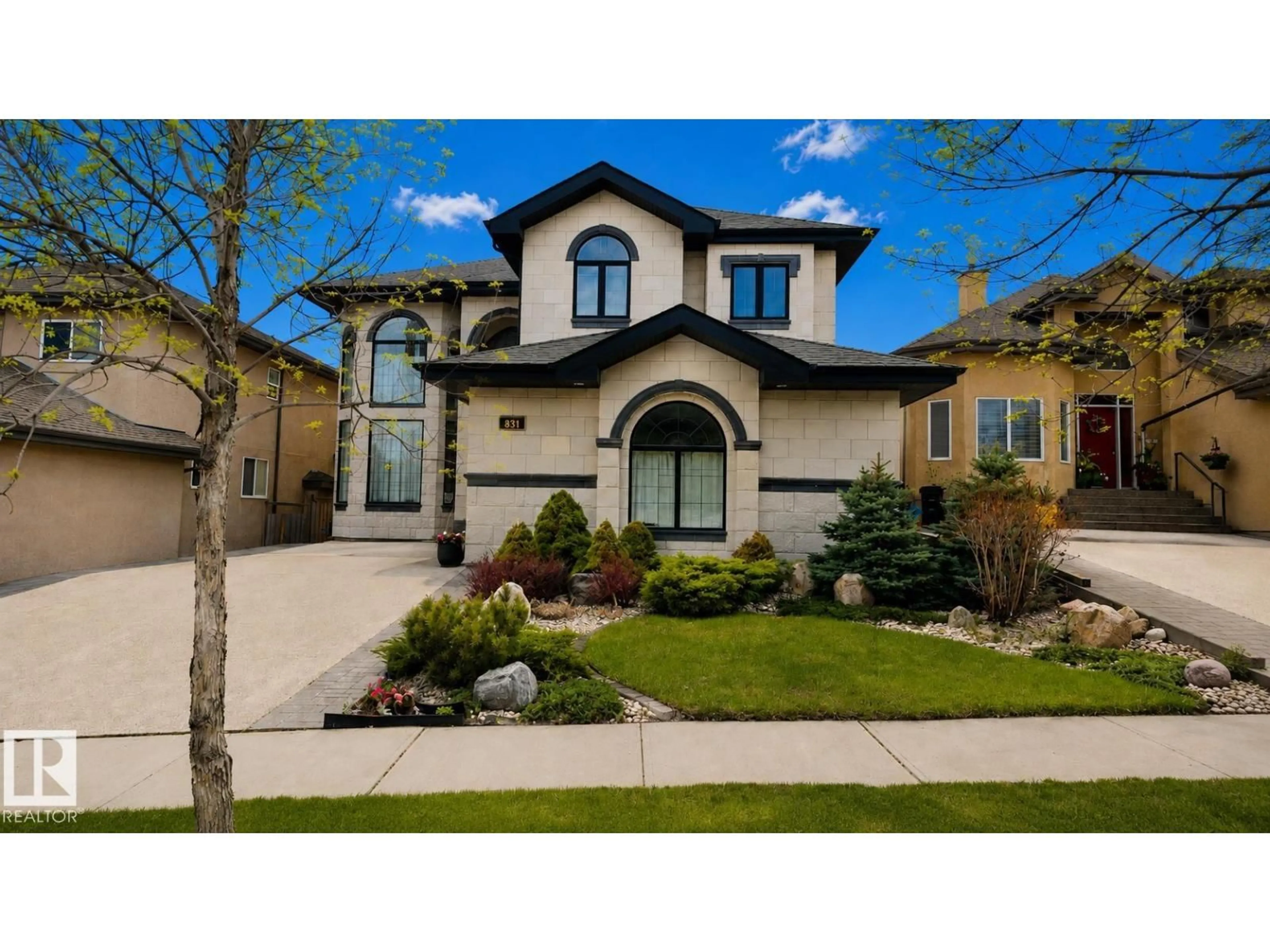 Home with vinyl exterior material, street for 831 HOLLANDS LD, Edmonton Alberta T6R3S9